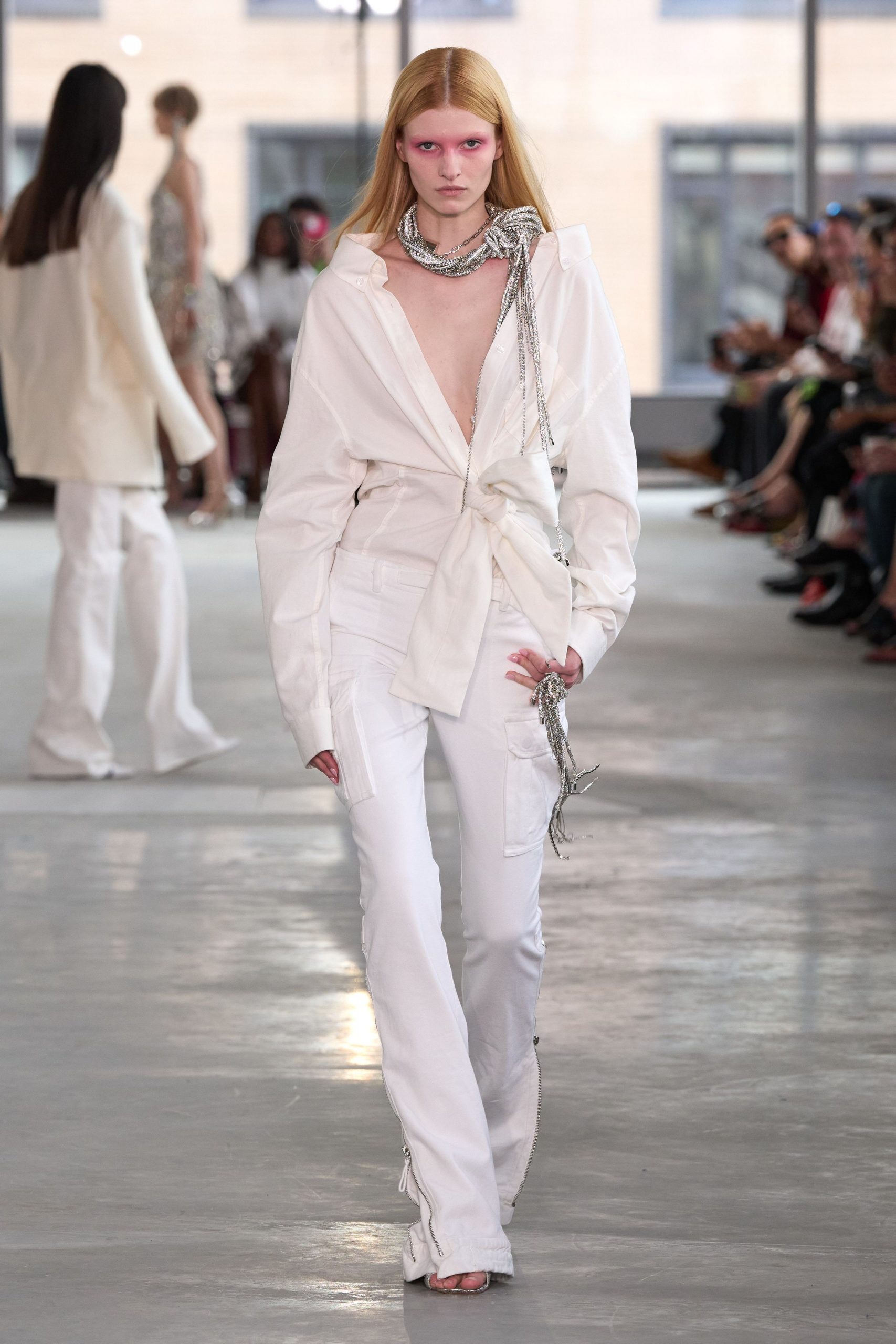 white relaxed shirt with fitted pants