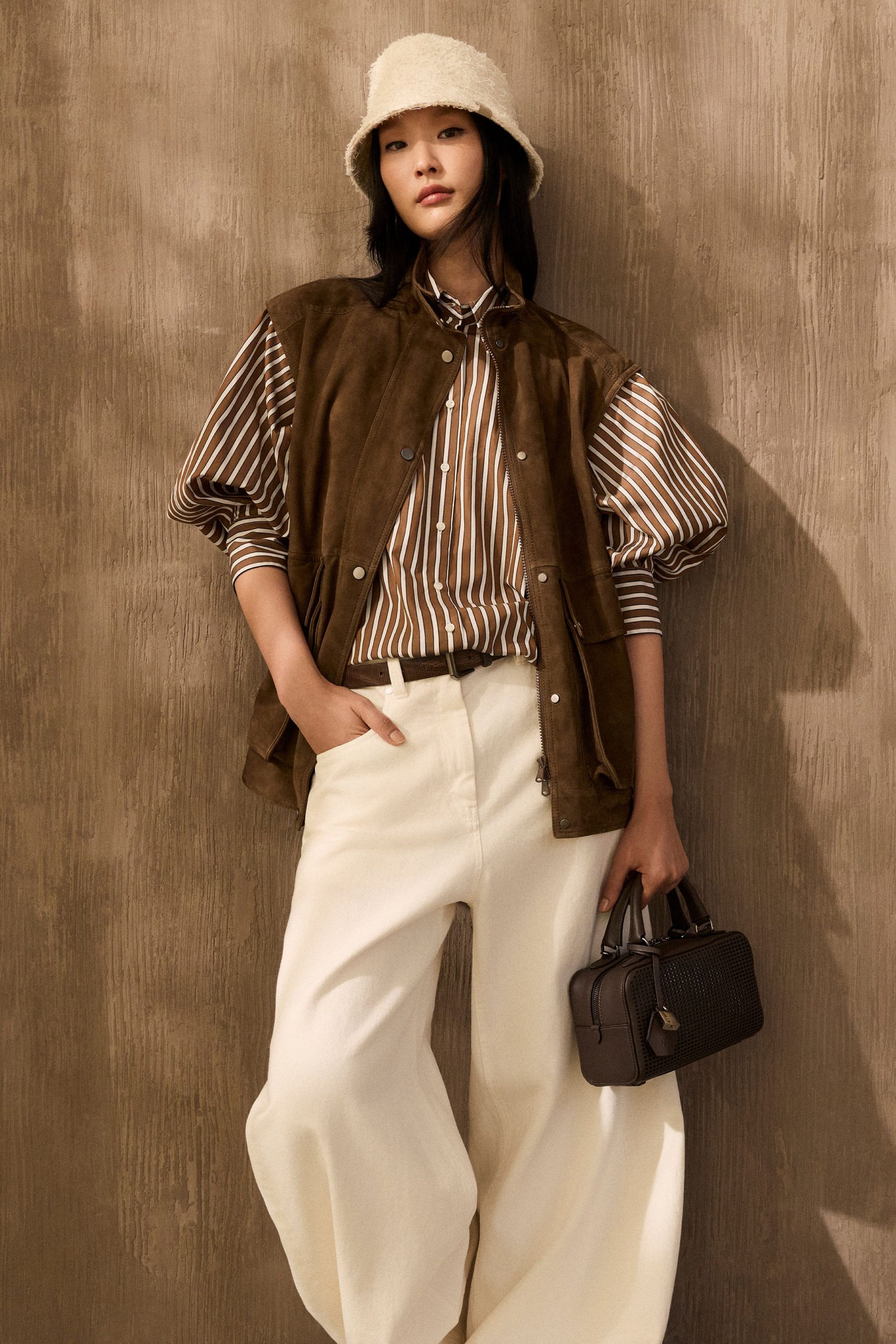 brown suede vest with striped shirt