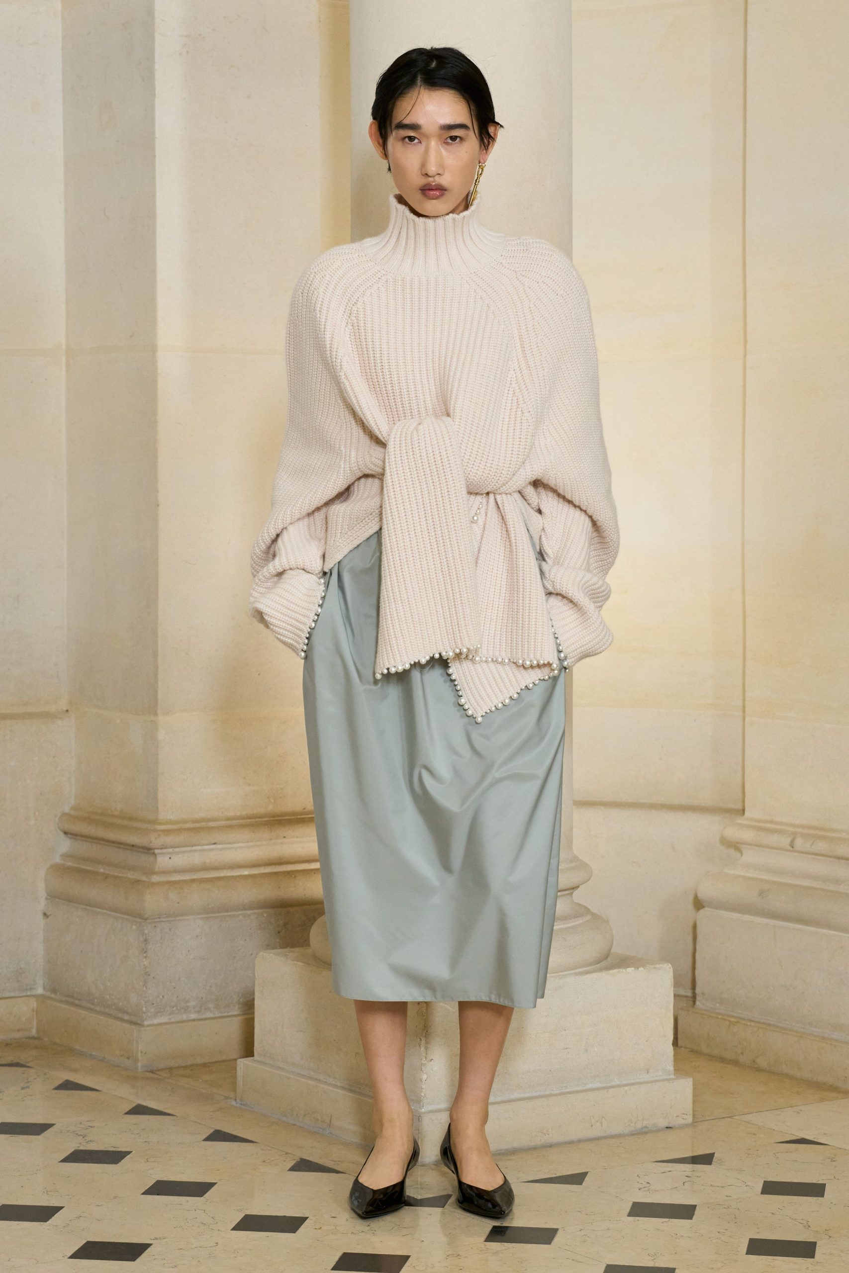 beige wool long-sleeve turtleneck oversized ribbed sweater