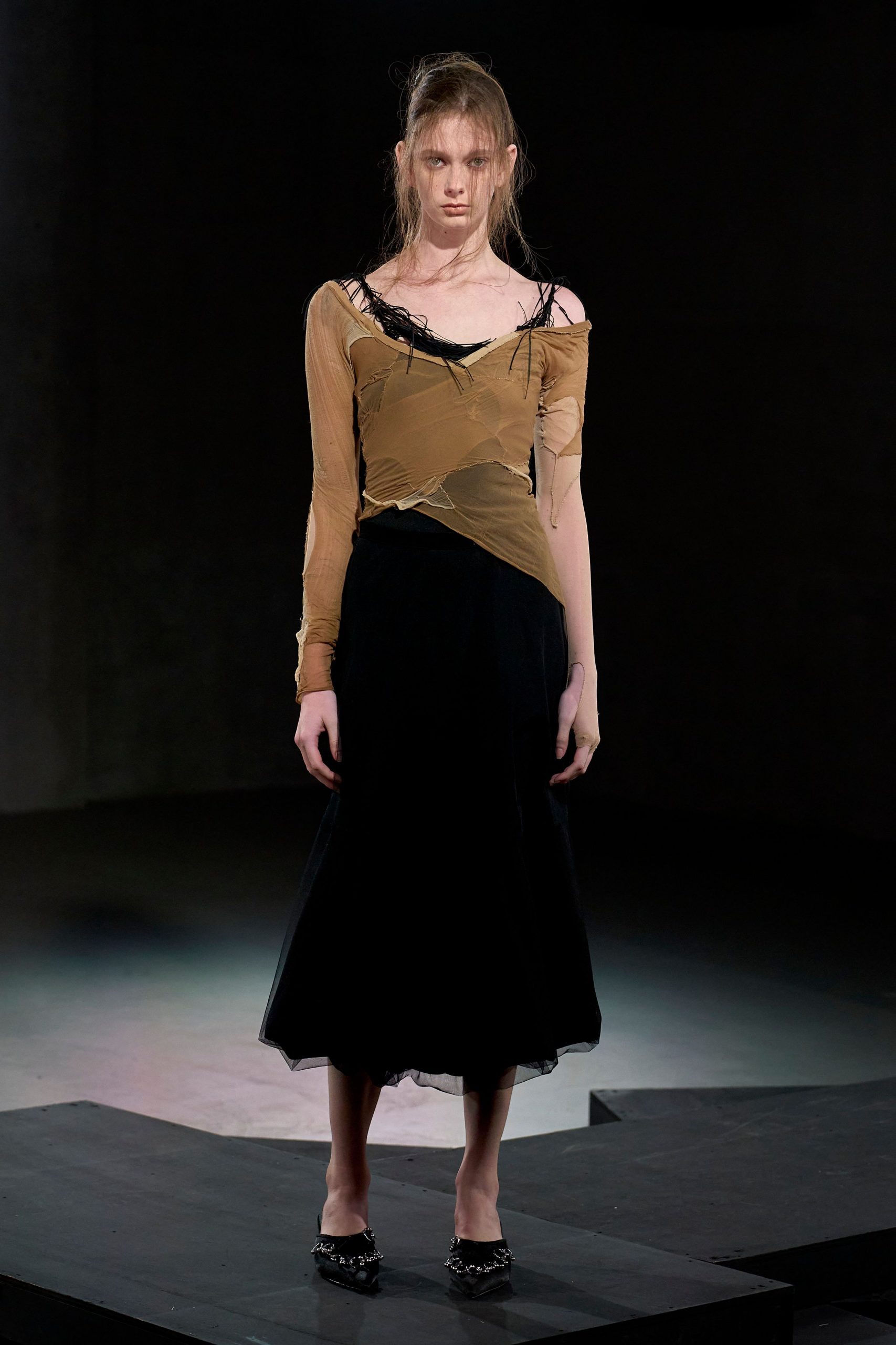 beige mesh off-shoulder top with black midi skirt