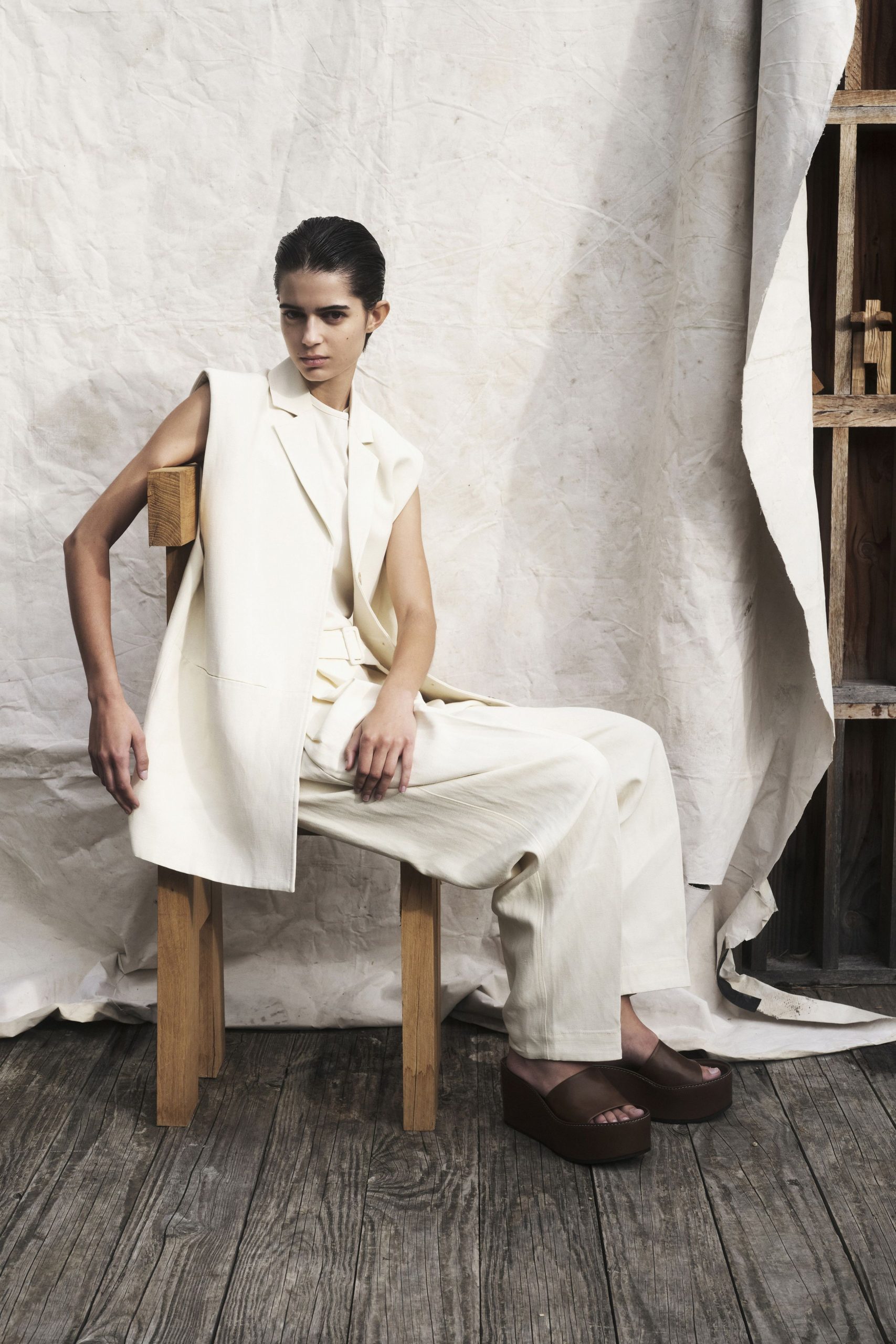 white cotton sleeveless collared relaxed vest