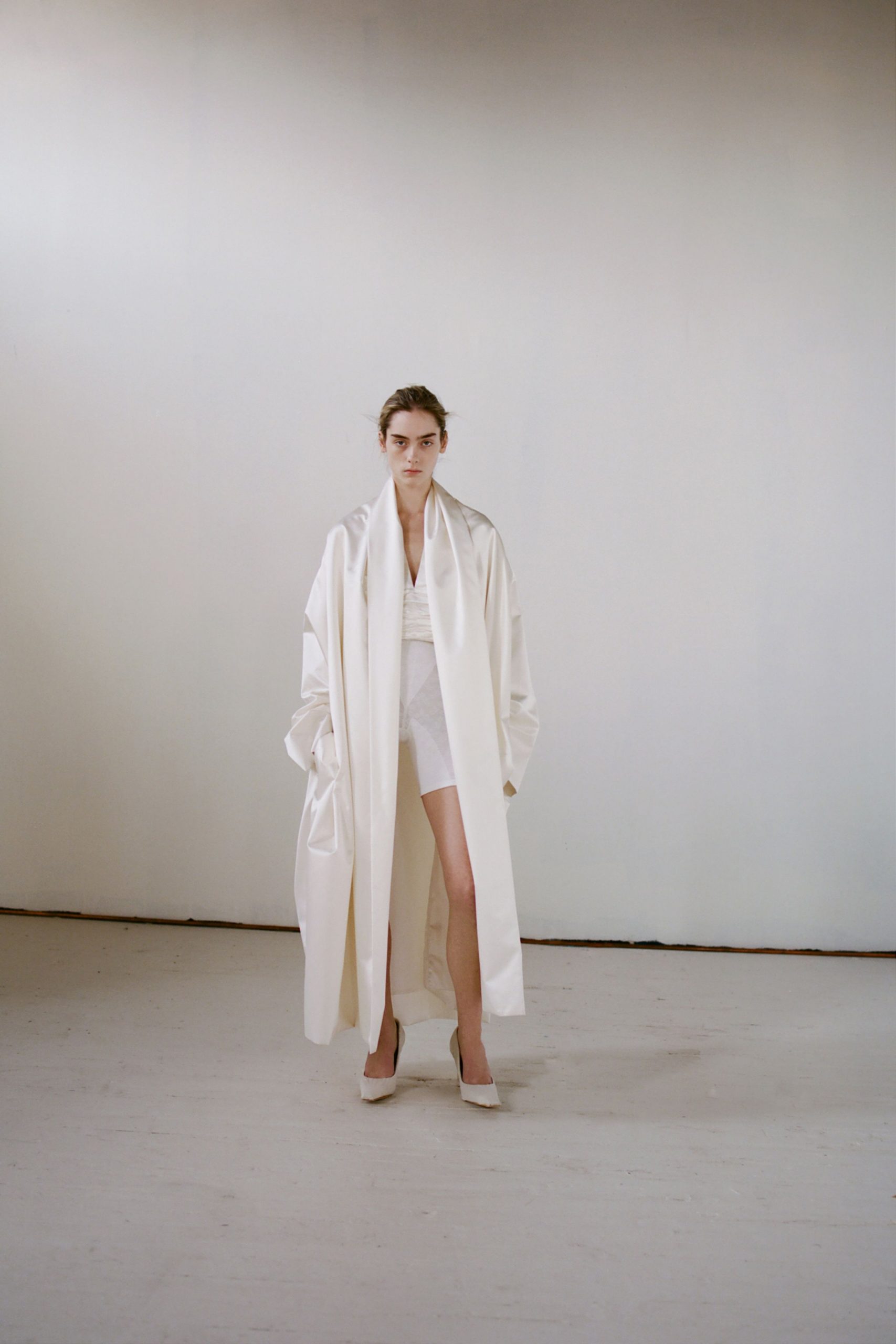 white silk long-sleeve collared oversized coat