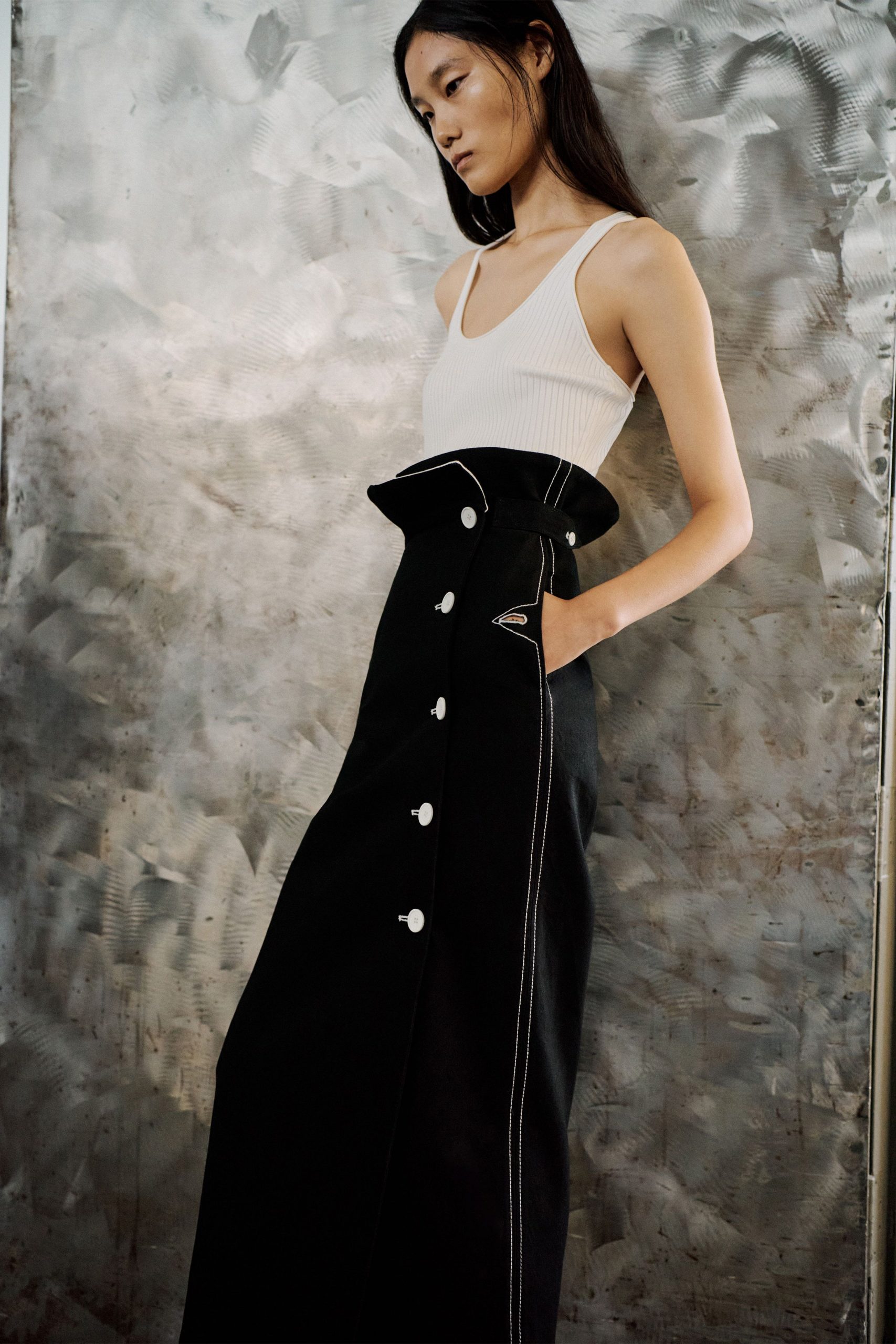 black denim fitted high-waisted buttoned pockets midi skirt