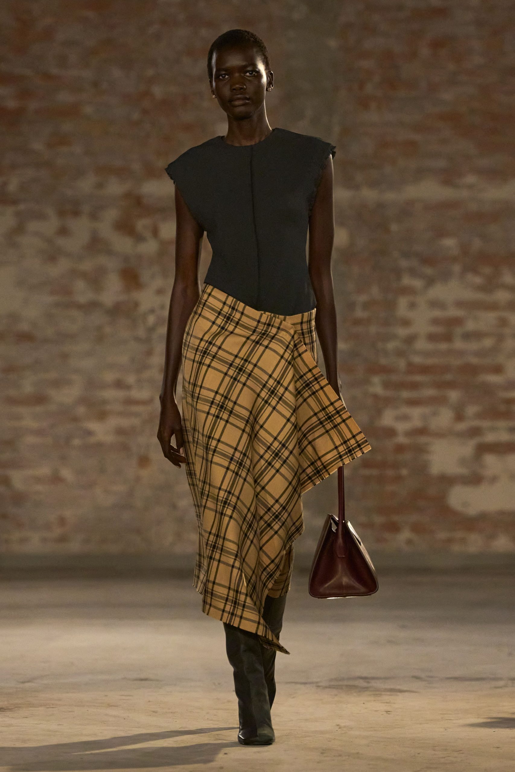 black fitted top with pleated skirt