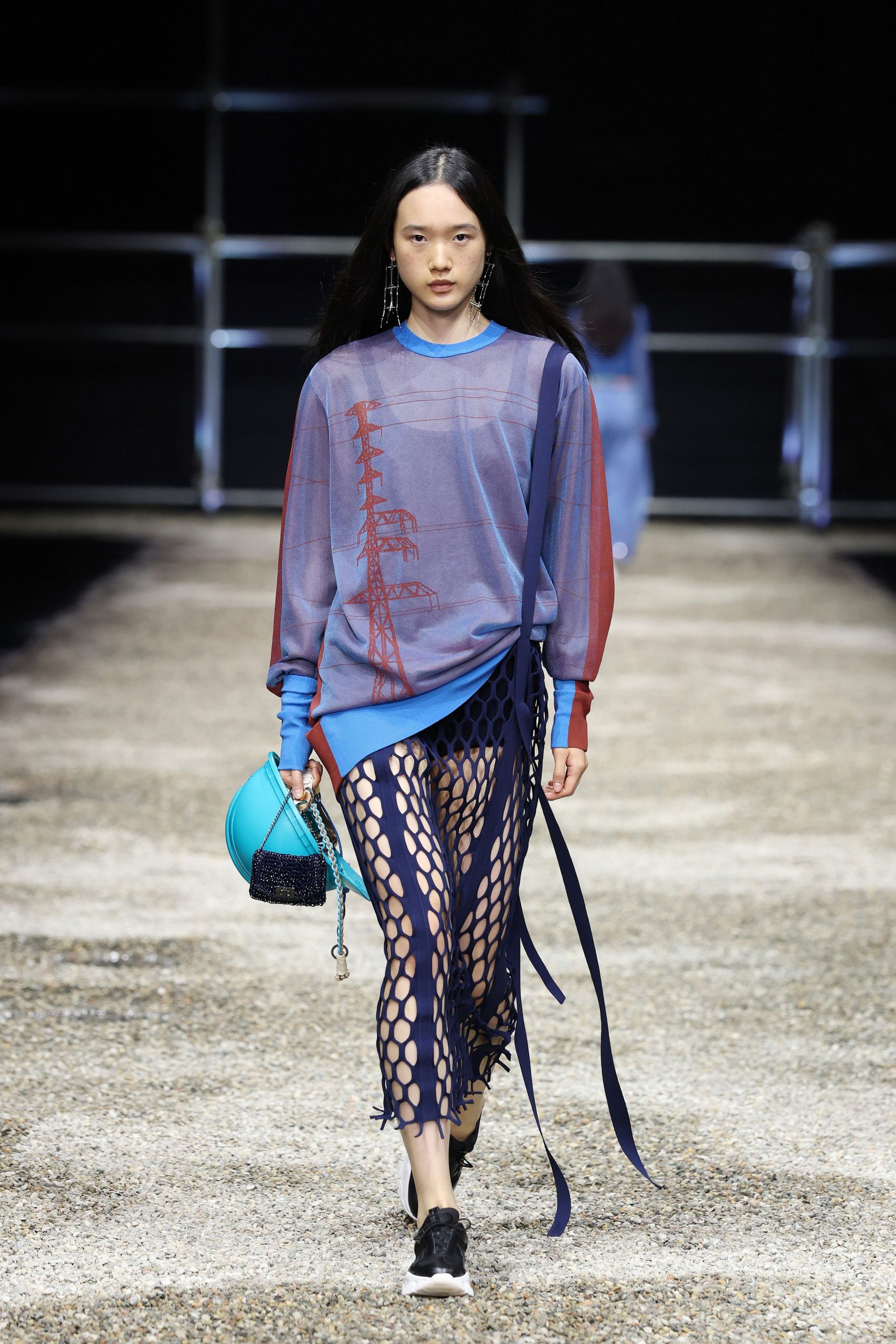 blue relaxed top with black mesh skirt