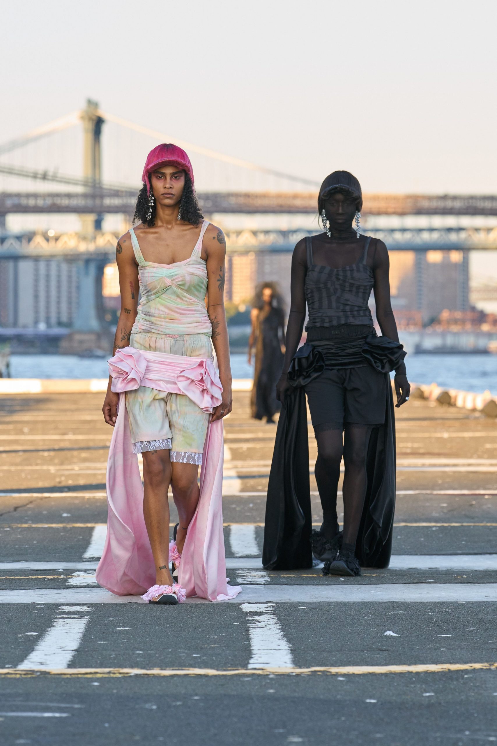 pink layered midi dress and black fitted dress