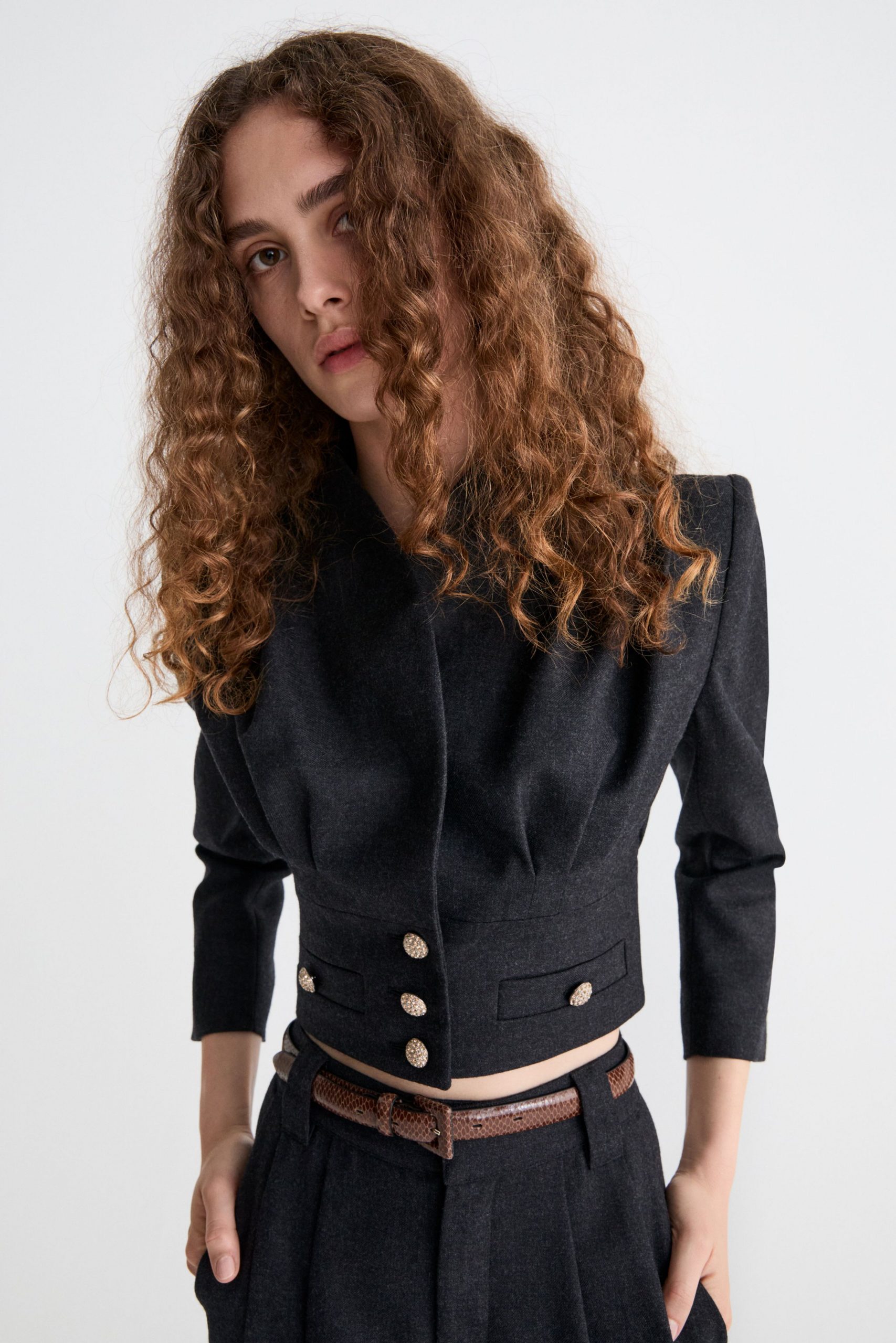 black wool long-sleeve collared fitted buttoned cropped blazer
