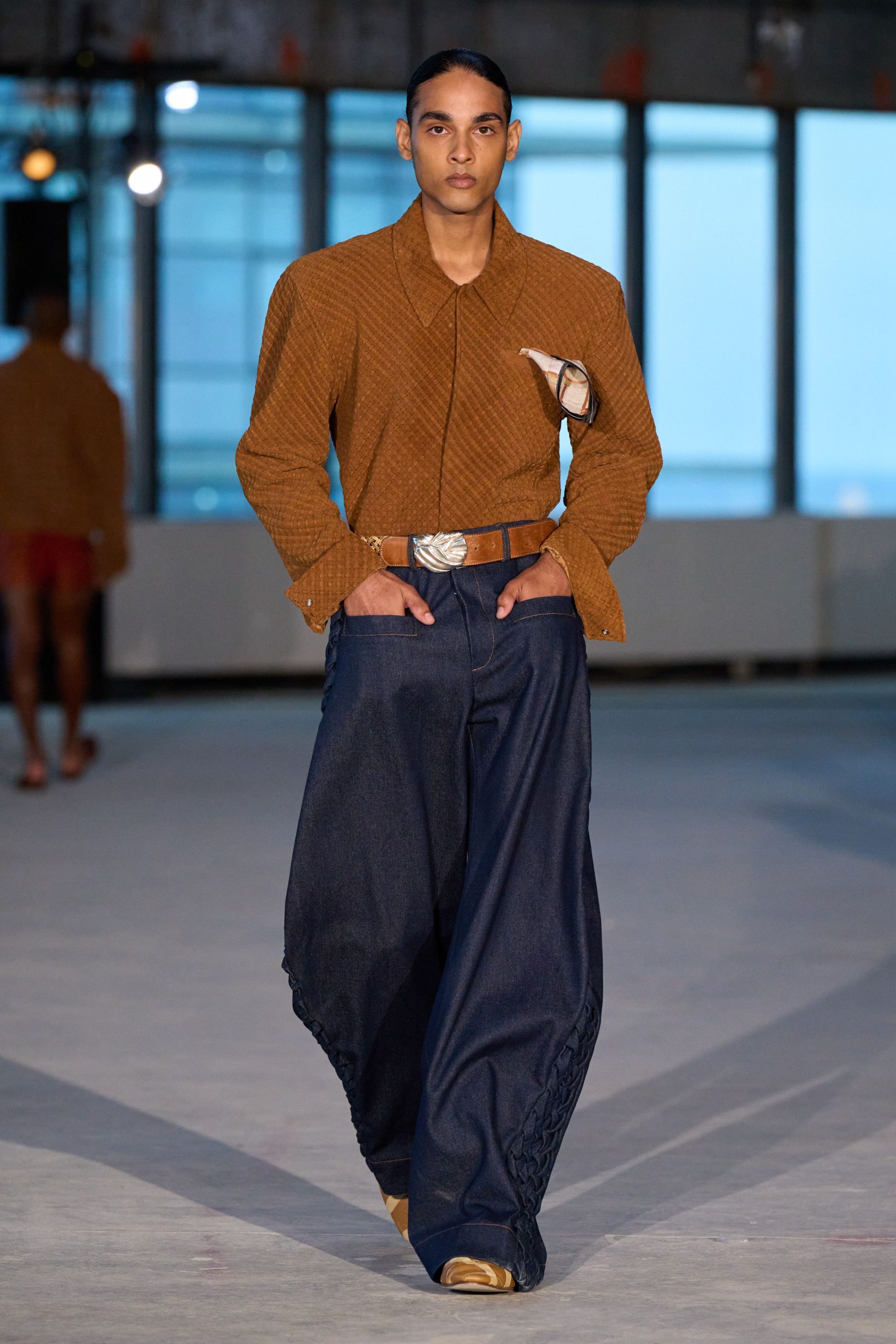 brown cotton shirt with blue denim pants
