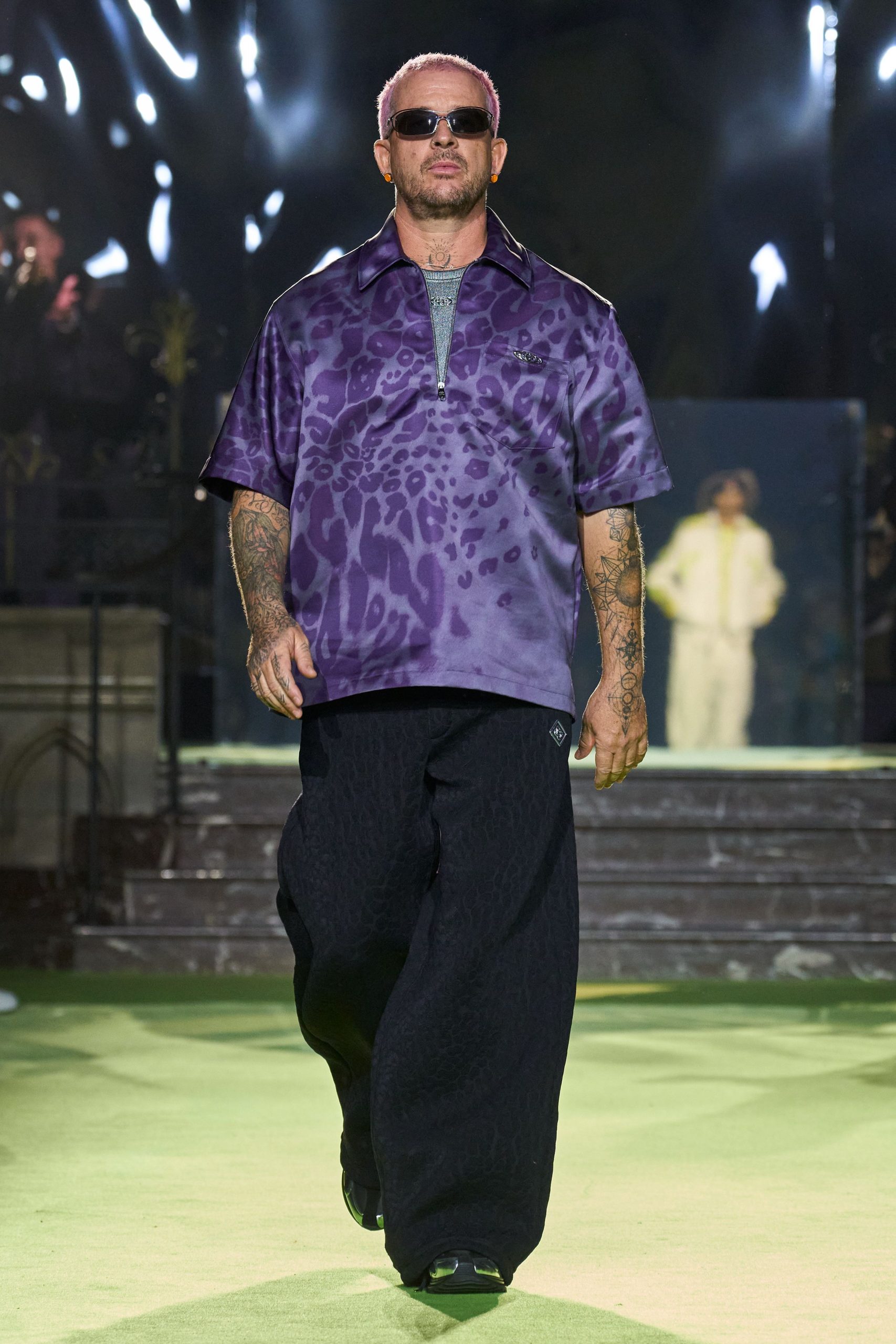 purple printed shirt with black pants