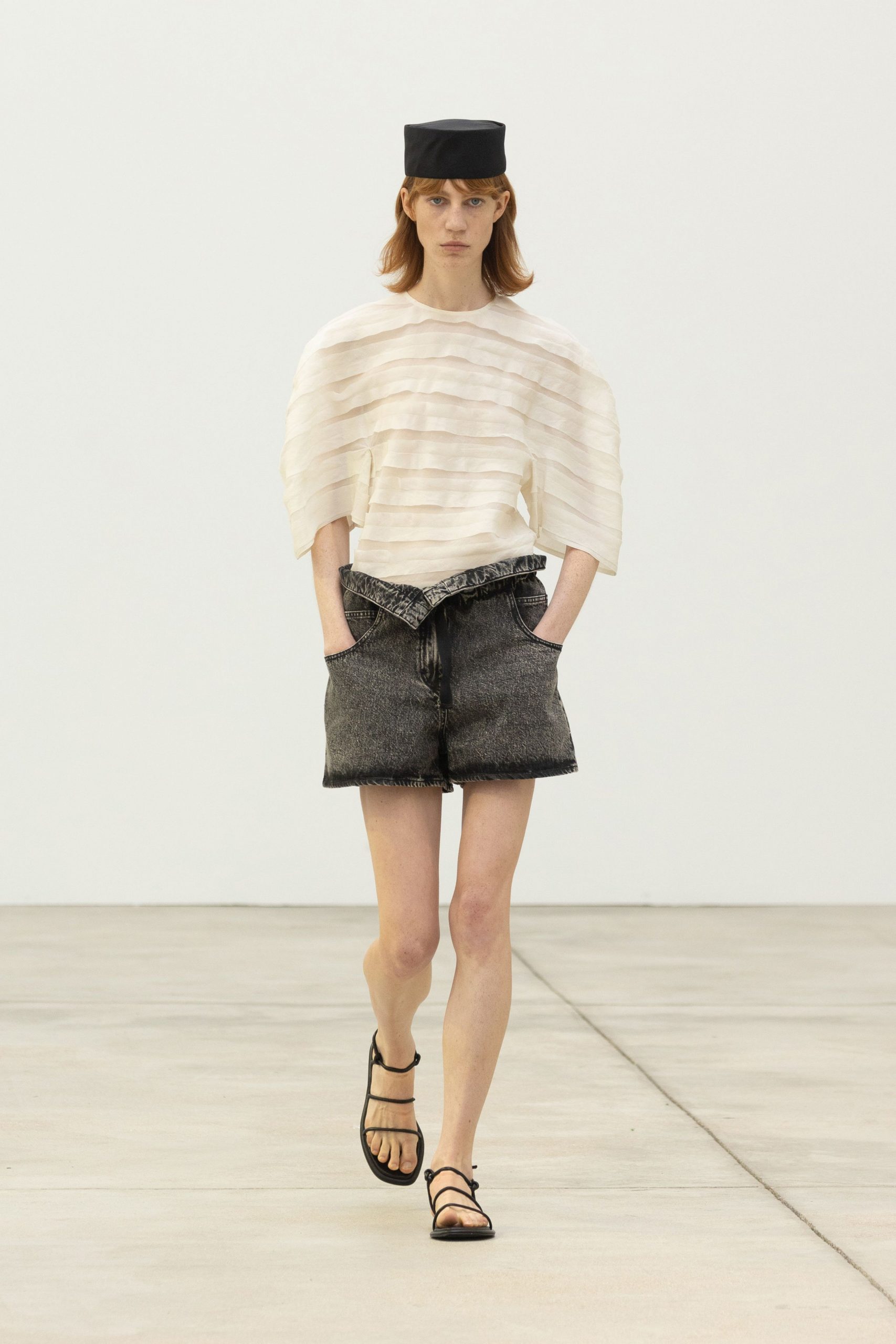 white layered top with black shorts