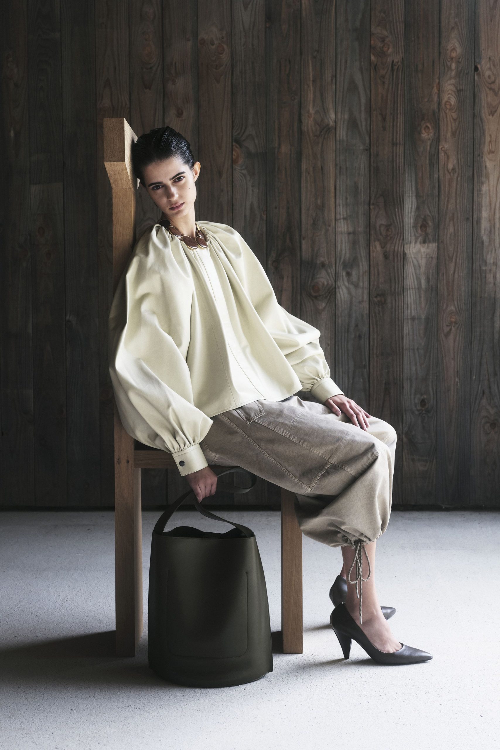 ivory cotton long-sleeve collared relaxed pleated top