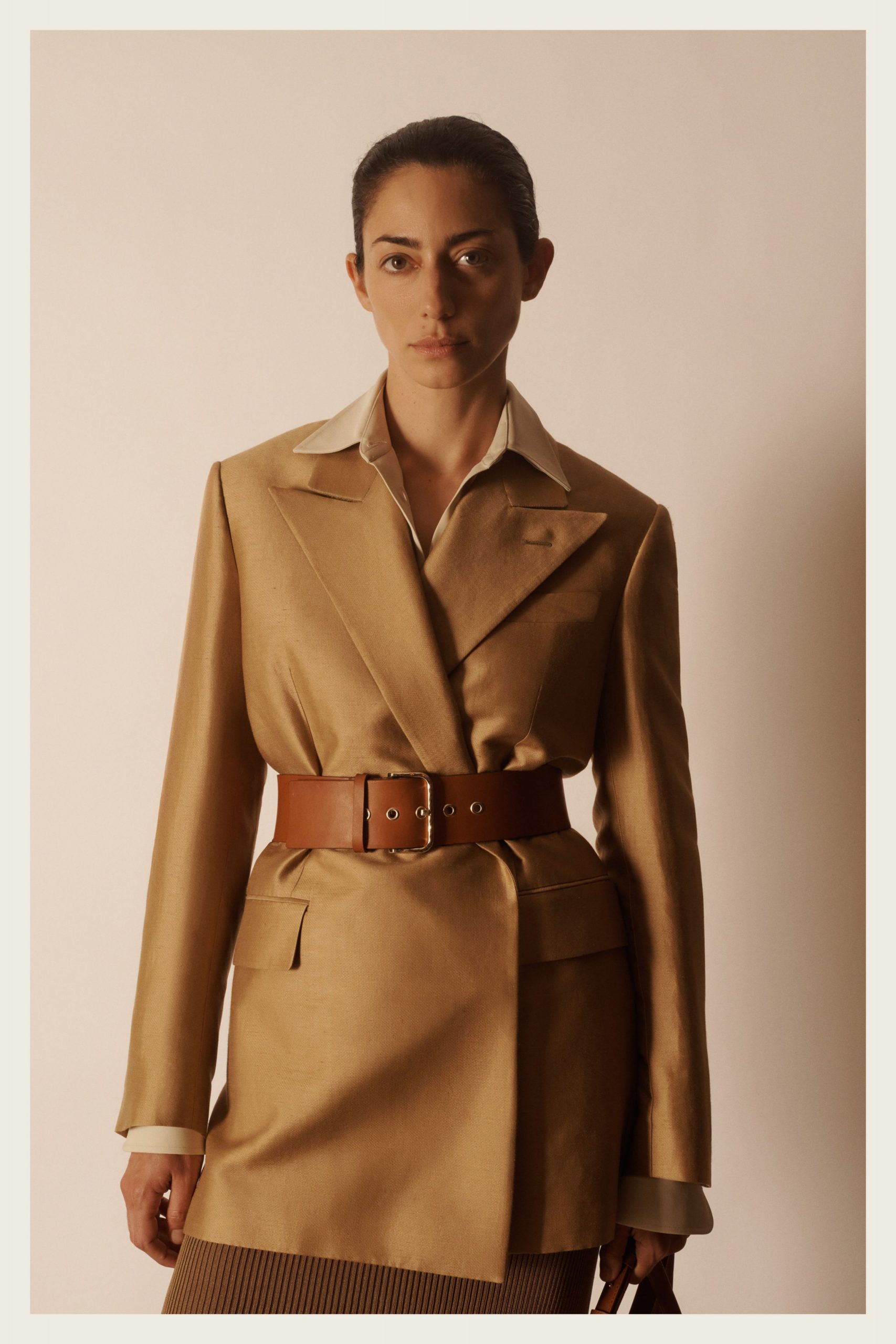 beige tailored blazer with brown belt