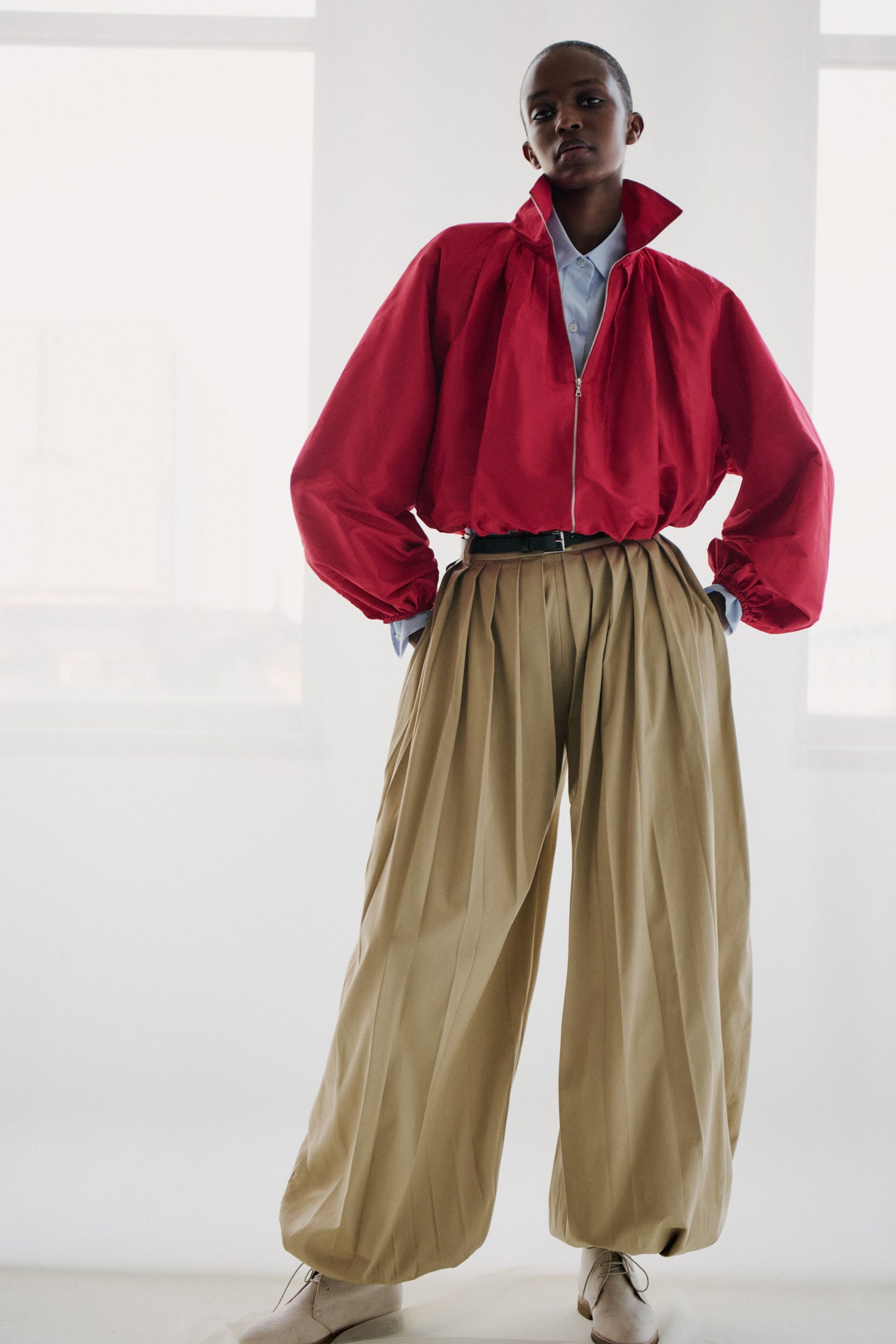 red cotton long-sleeve collared oversized zippered padded jacket