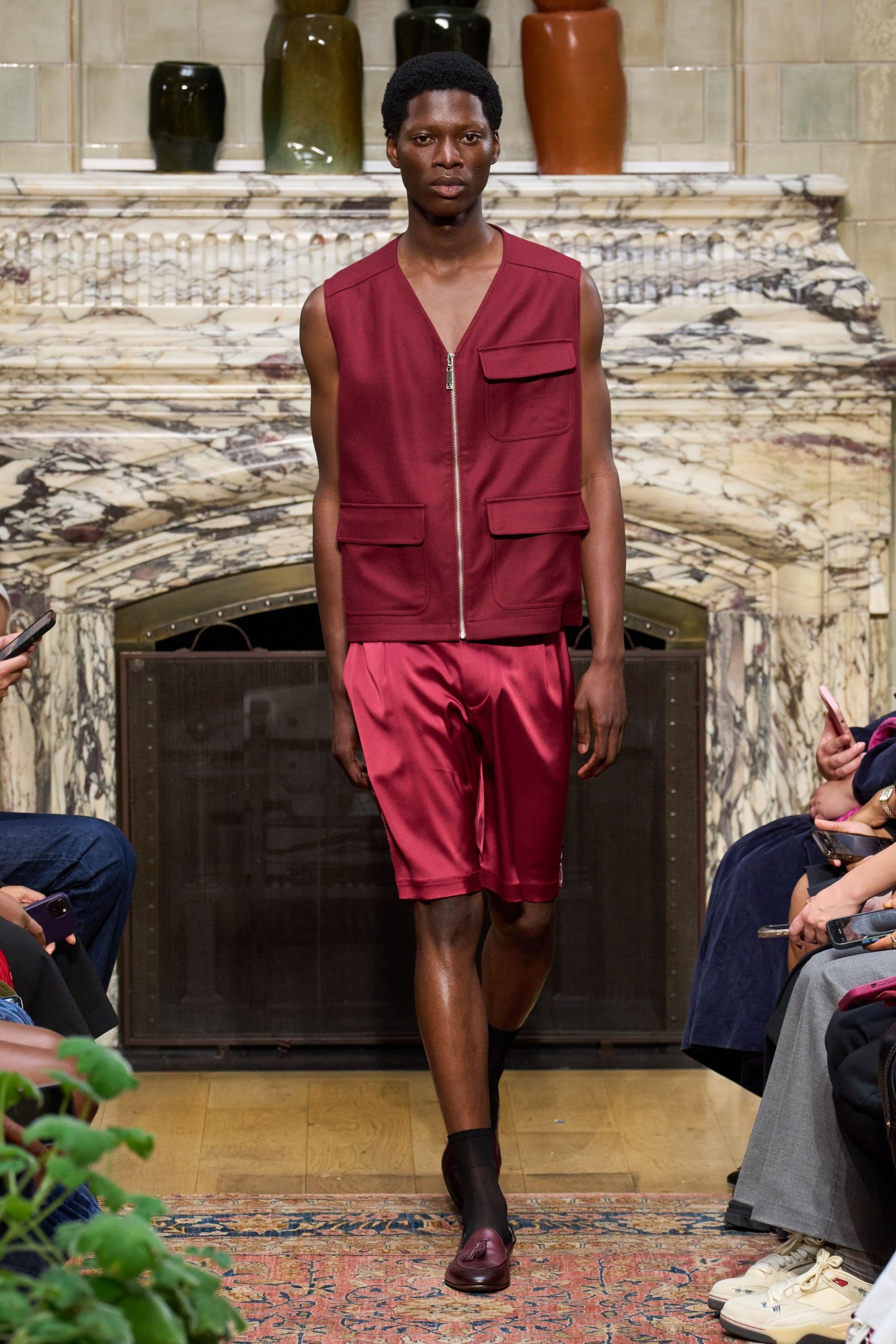 maroon vest red shorts outfit