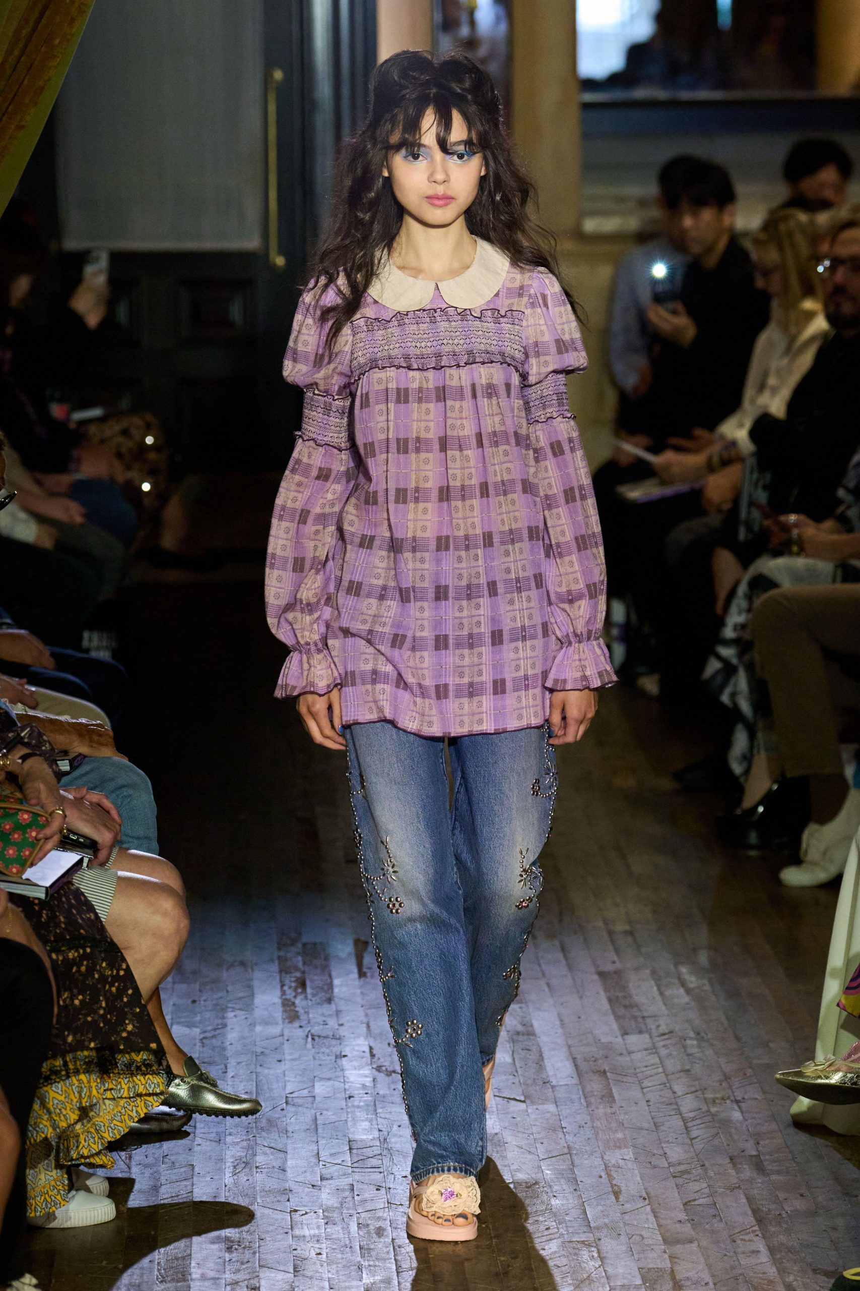 purple relaxed top with jeans