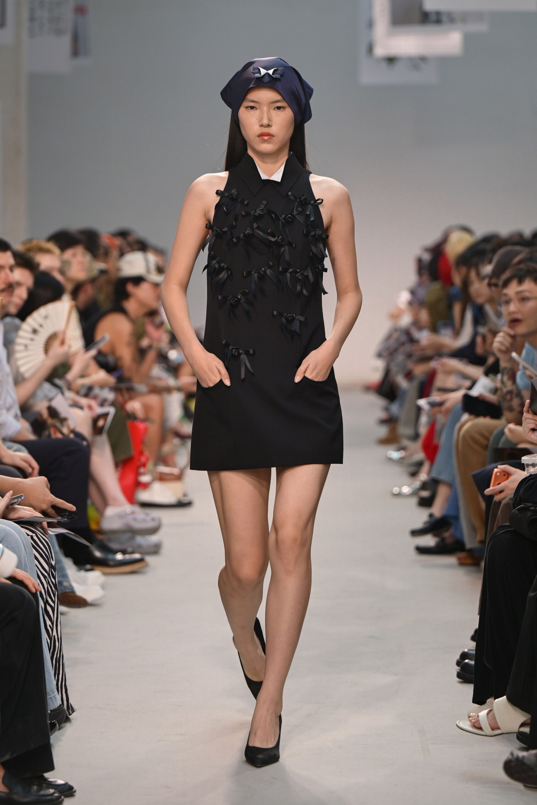 black fitted mini dress with hat