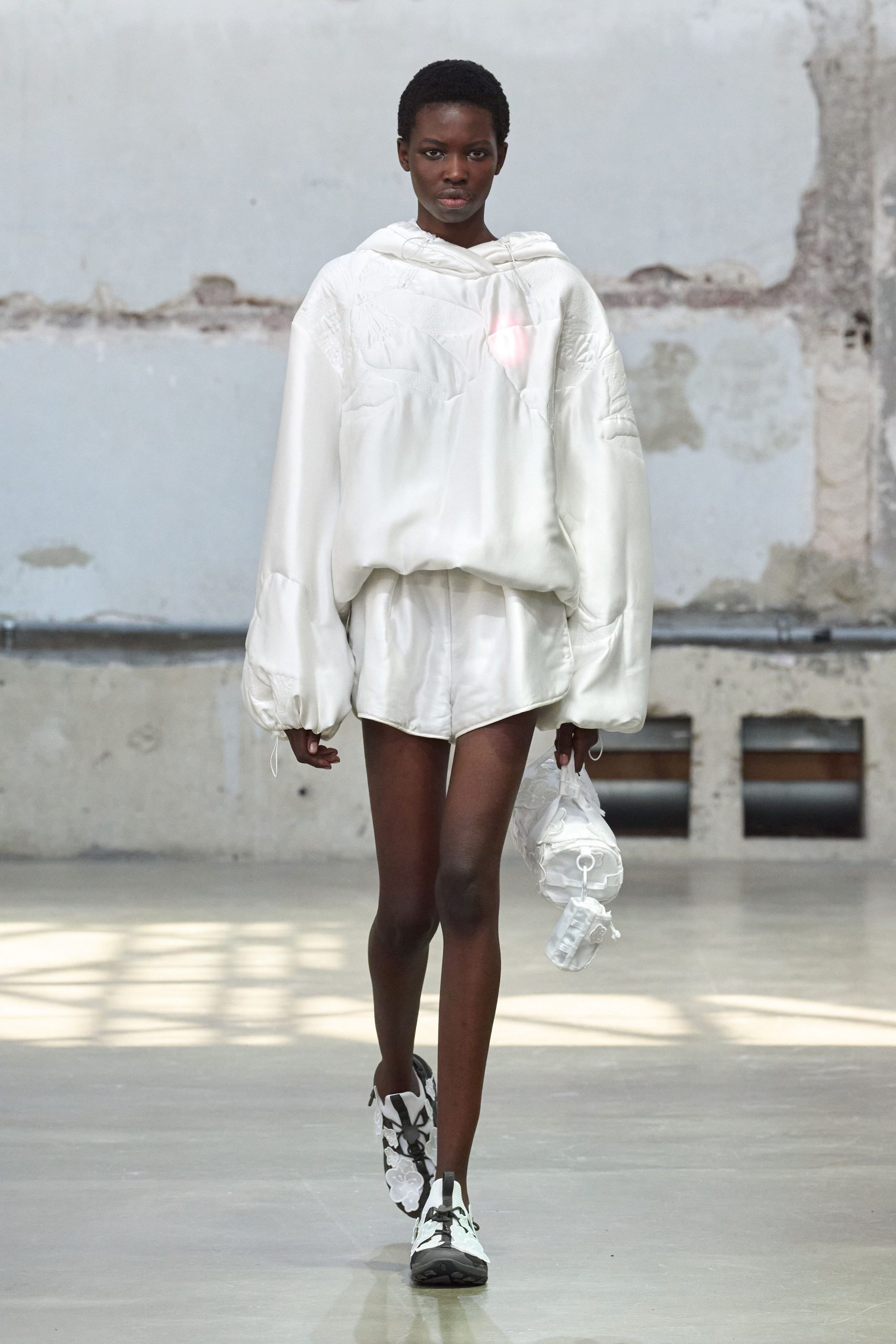 white oversized hoodie and shorts