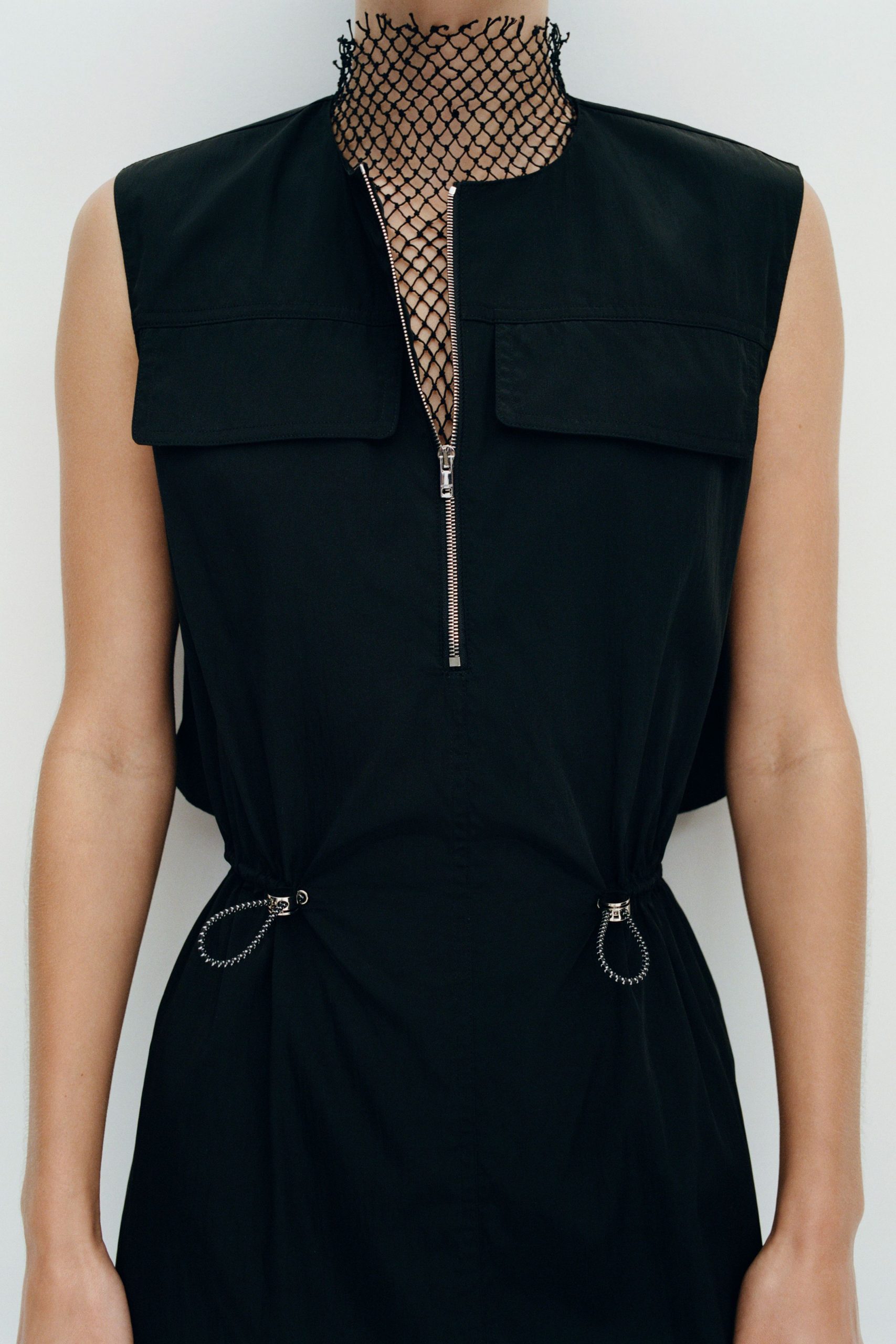 black fitted sleeveless dress