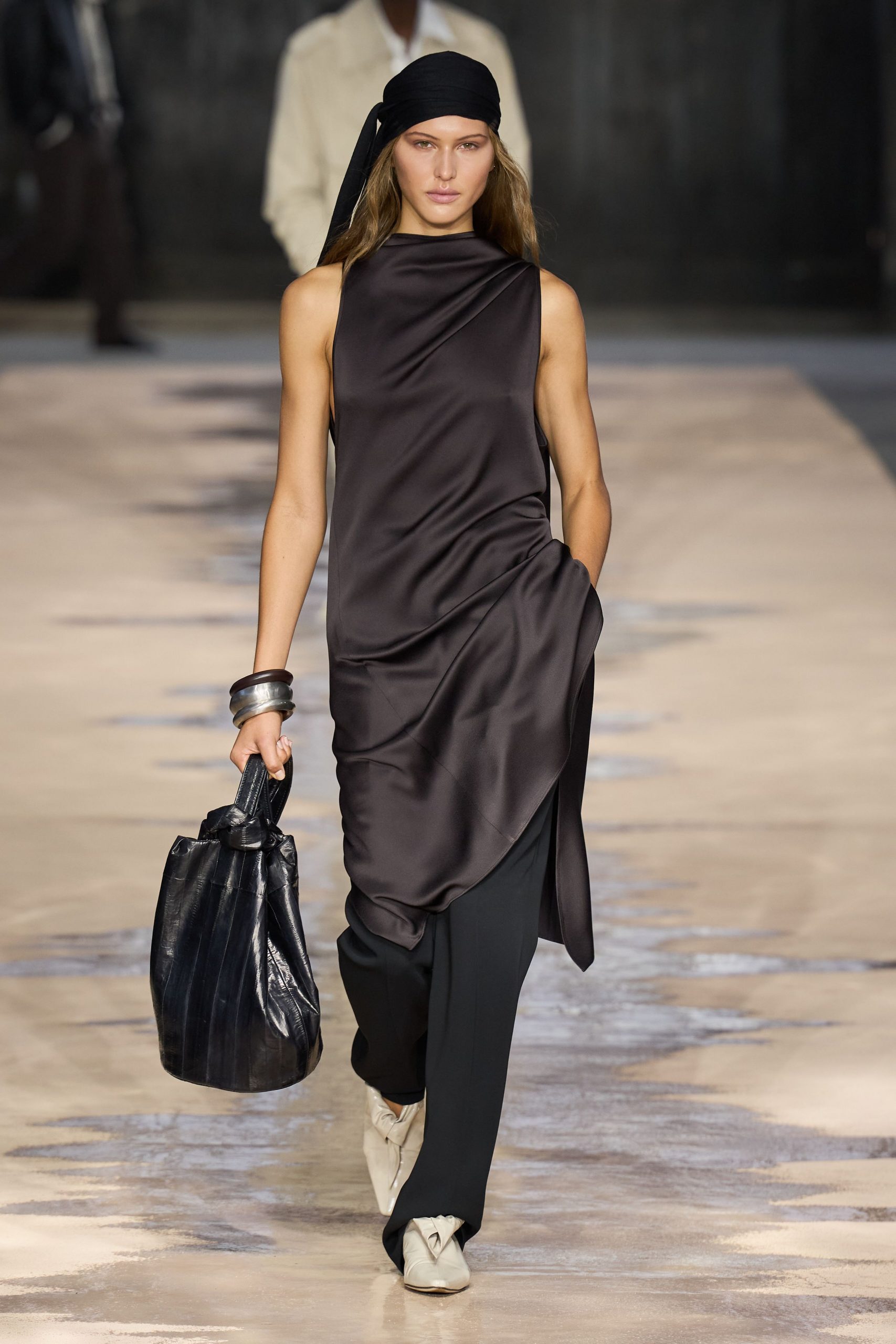 black silk sleeveless high-neck fitted draped flowing top