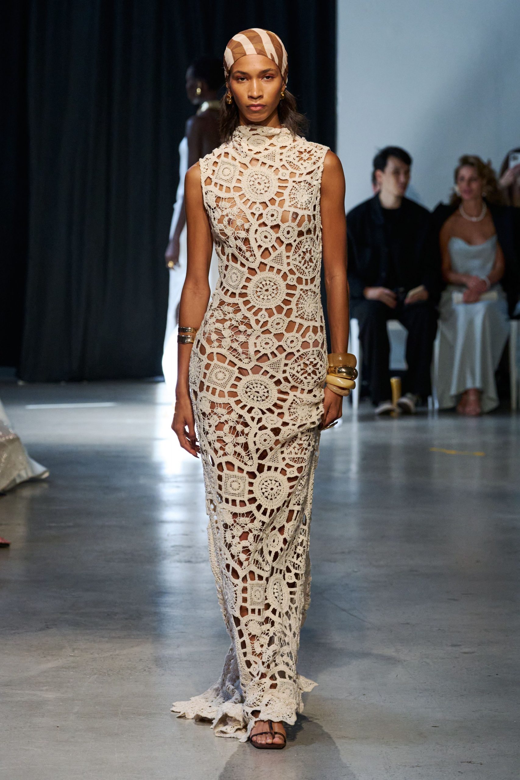 beige cotton sleeveless high-neck fitted embroidered sheer gown