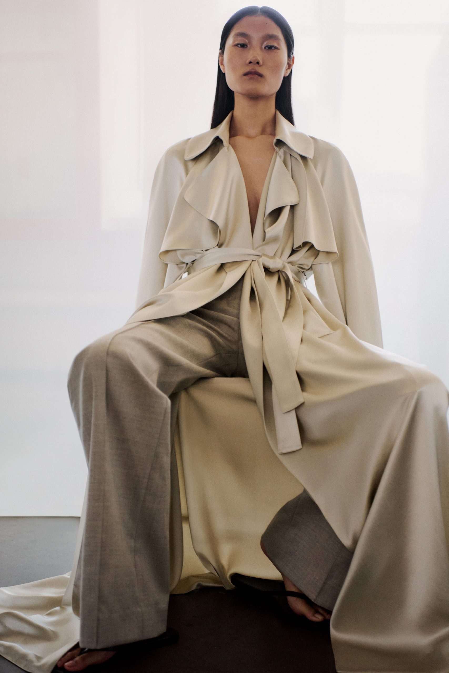 white silk long-sleeve v-neck relaxed ruffled belted coat