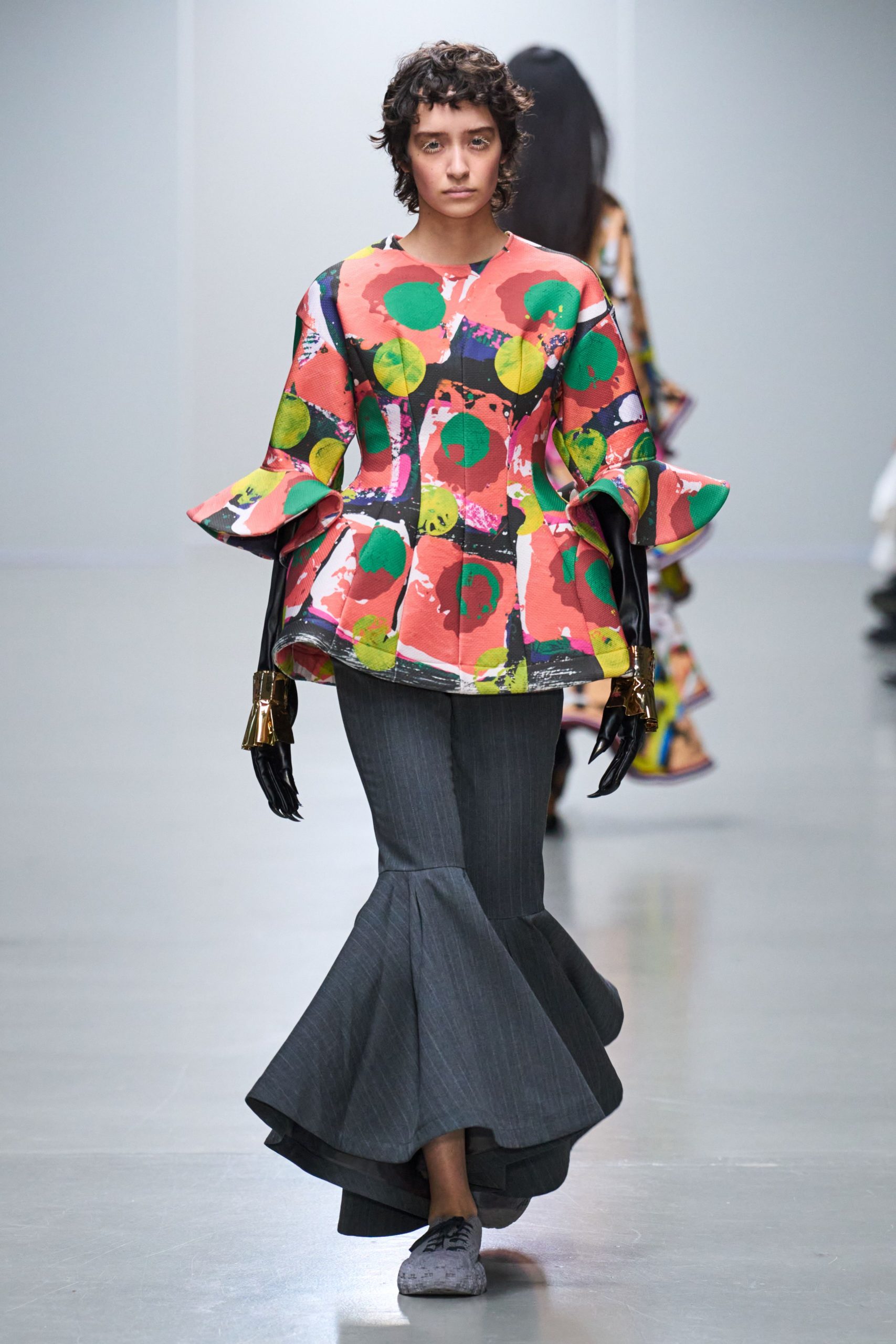 multi-colored flared top and gray skirt