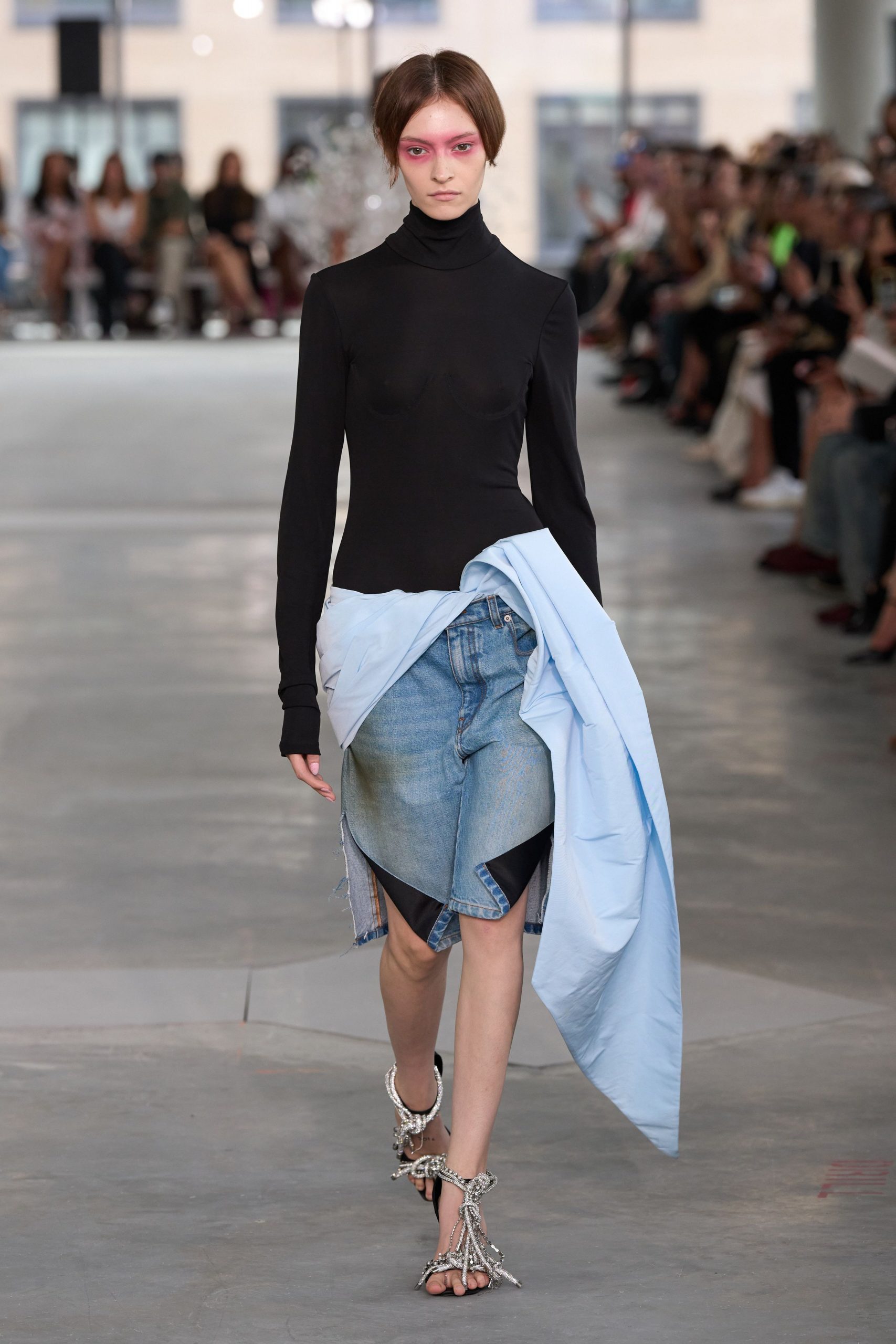 black fitted top with denim skirt