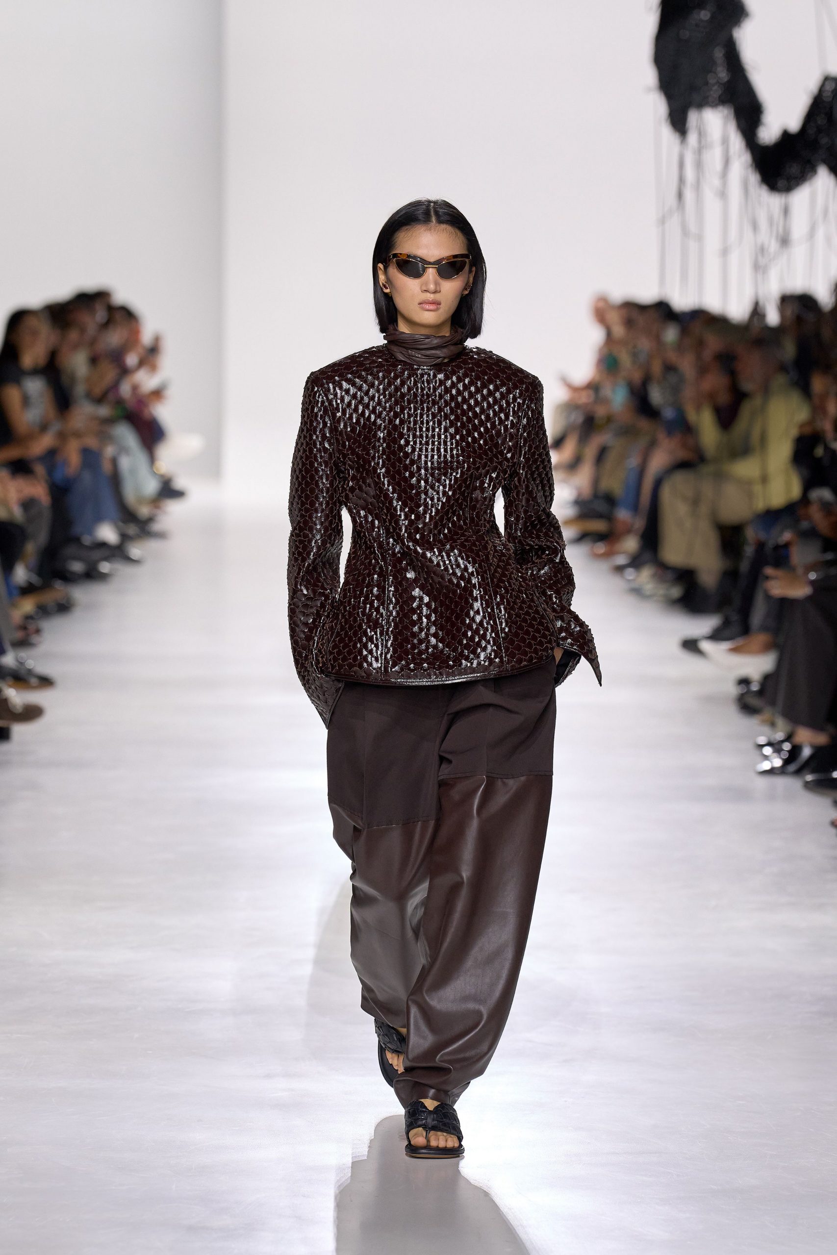 brown leather long-sleeve collared fitted textured shiny jacket
