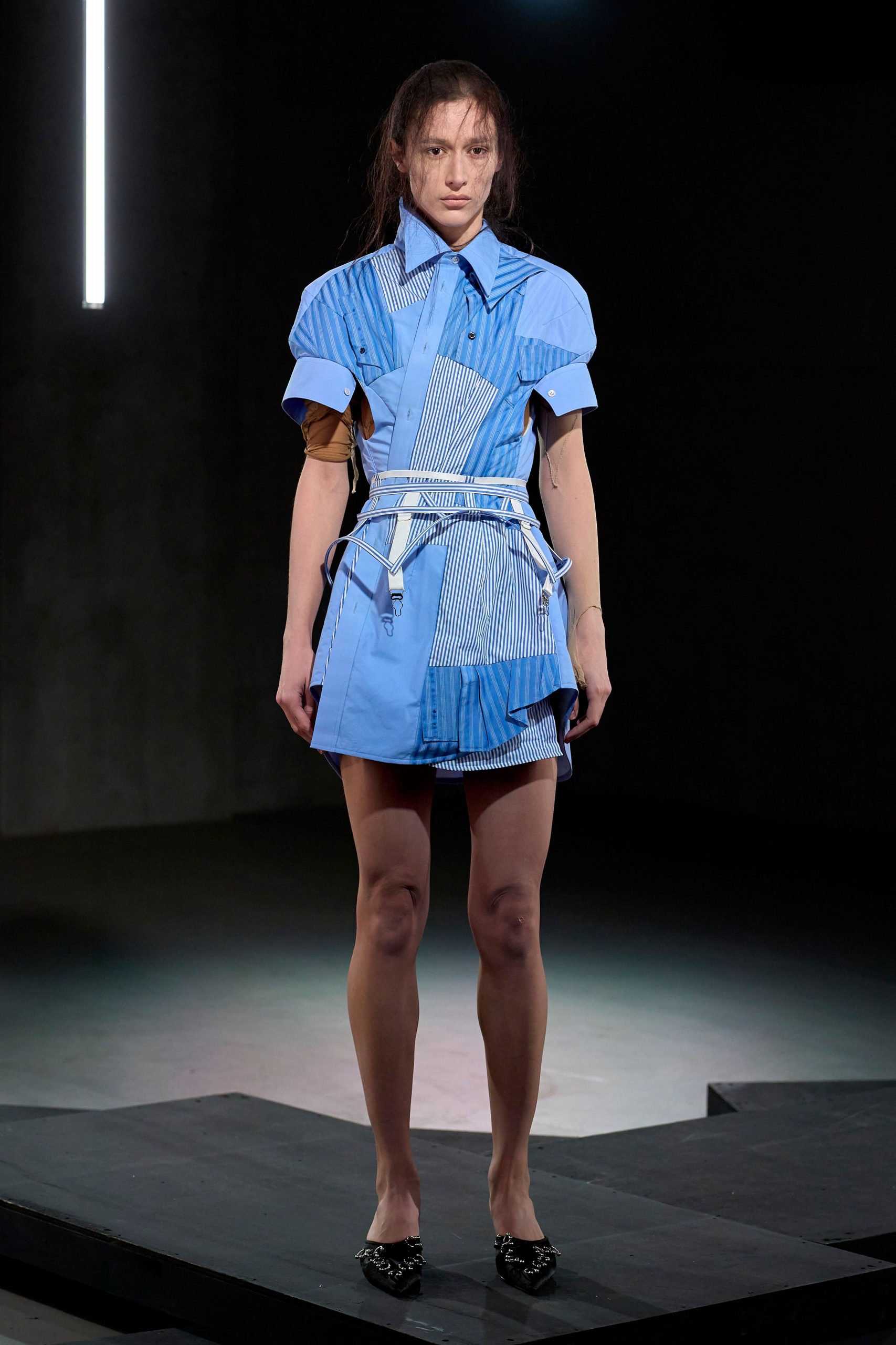 blue pleated mini dress with black shoes