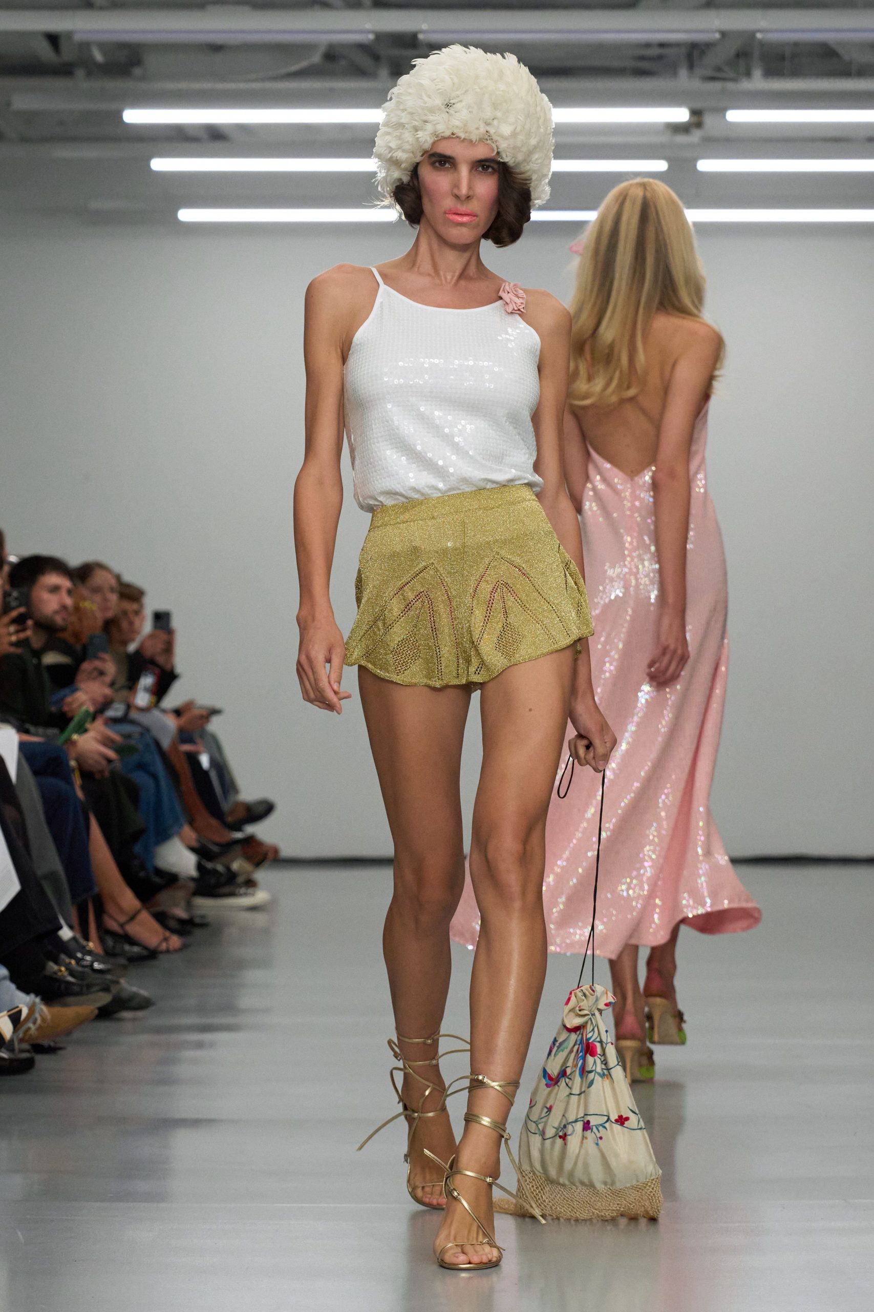 white sequined top with gold skirt