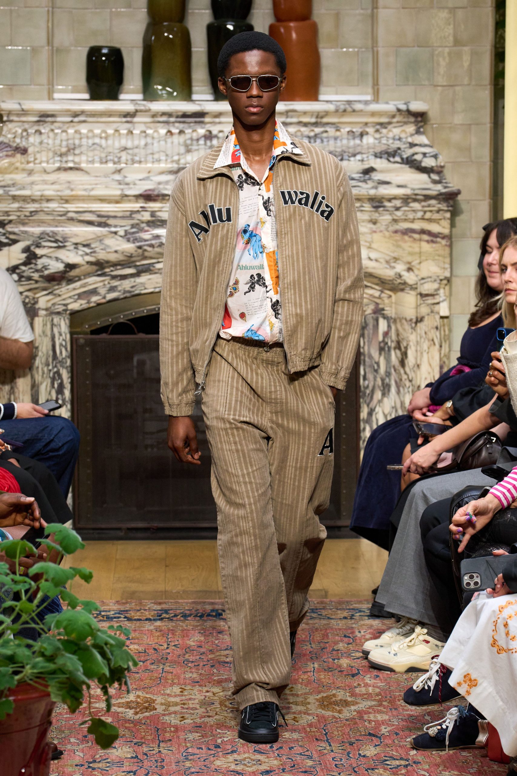 beige relaxed jacket with printed shirt