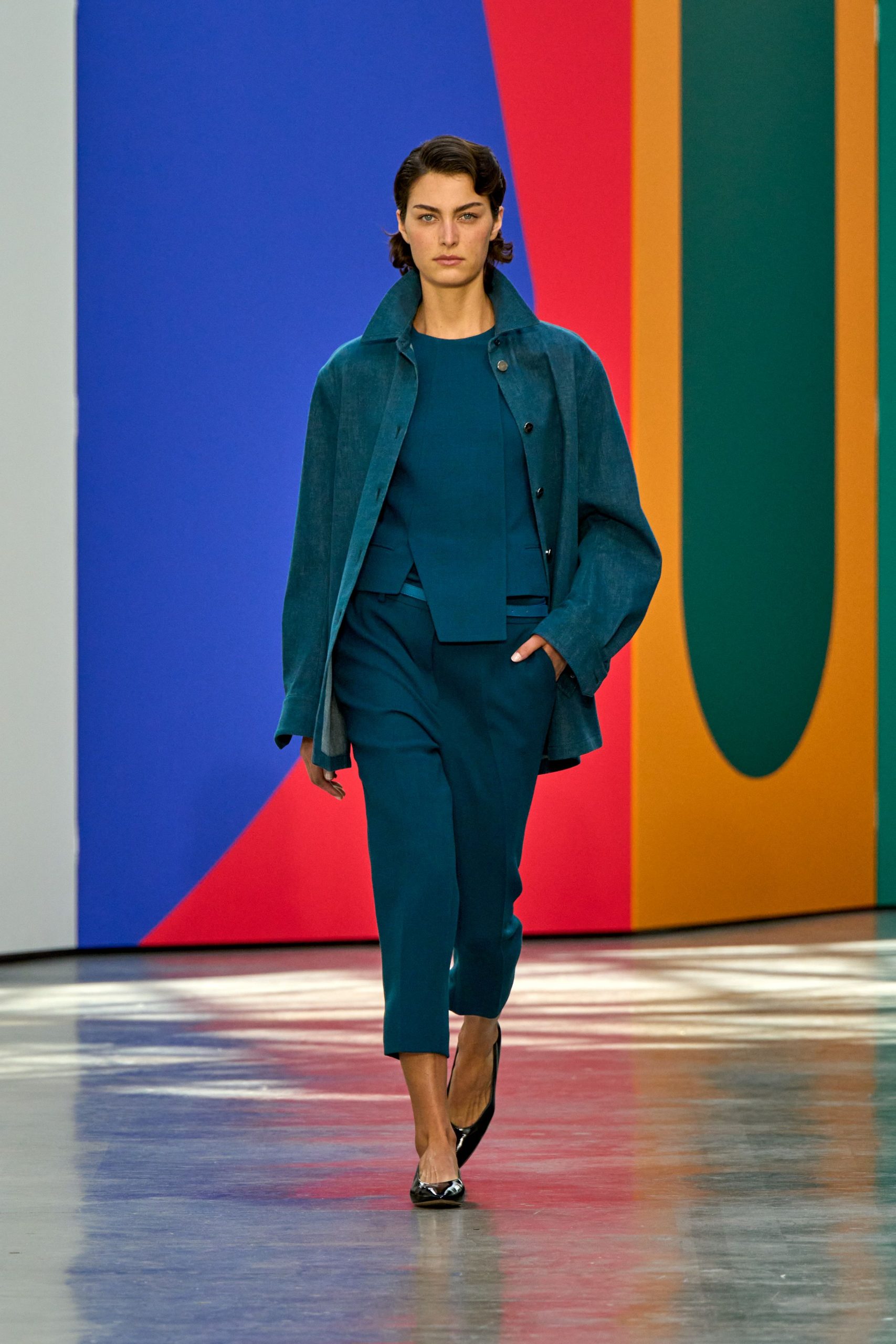 blue cotton jacket and tailored pants