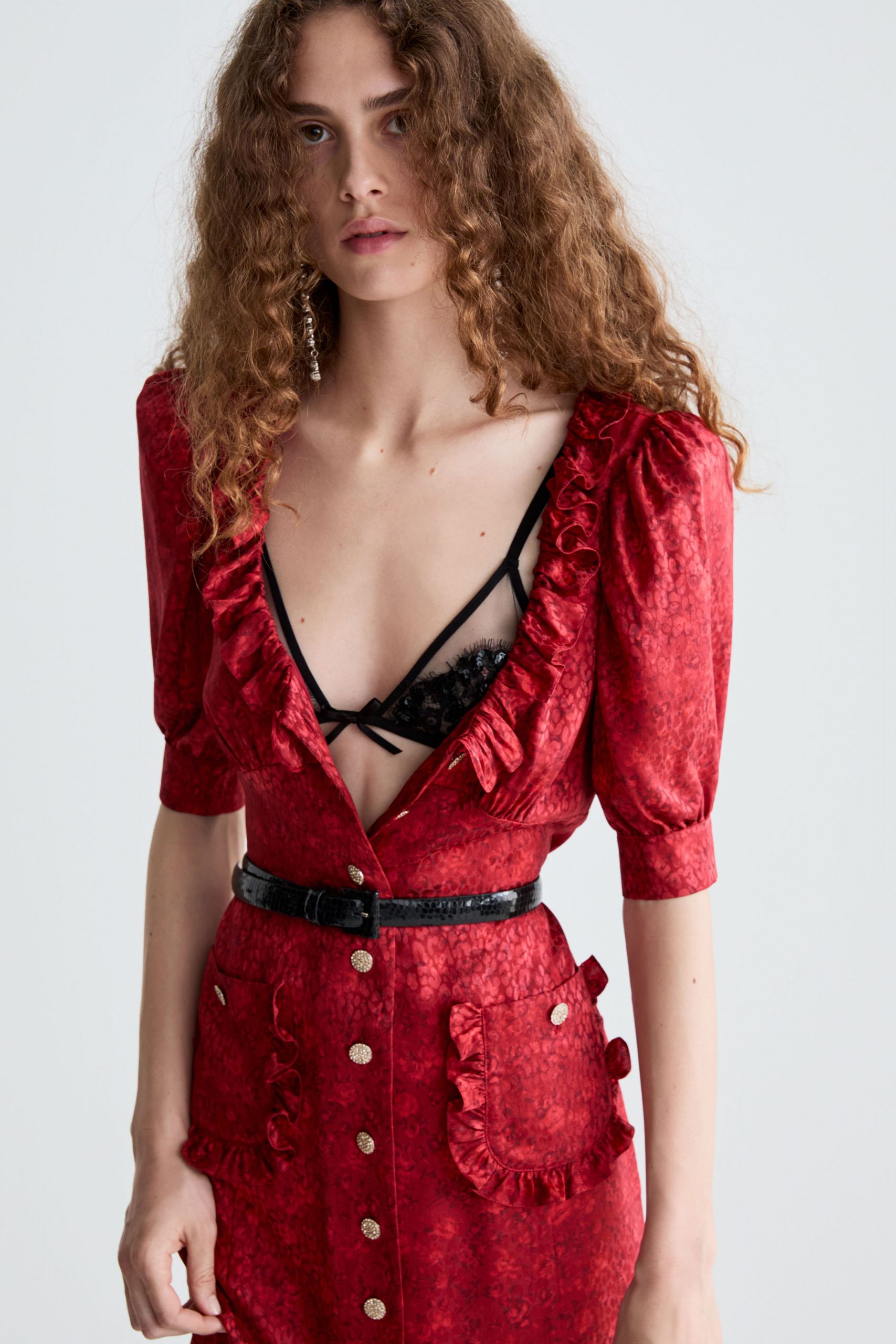 red silk short-sleeve v-neck fitted ruffled buttoned dress