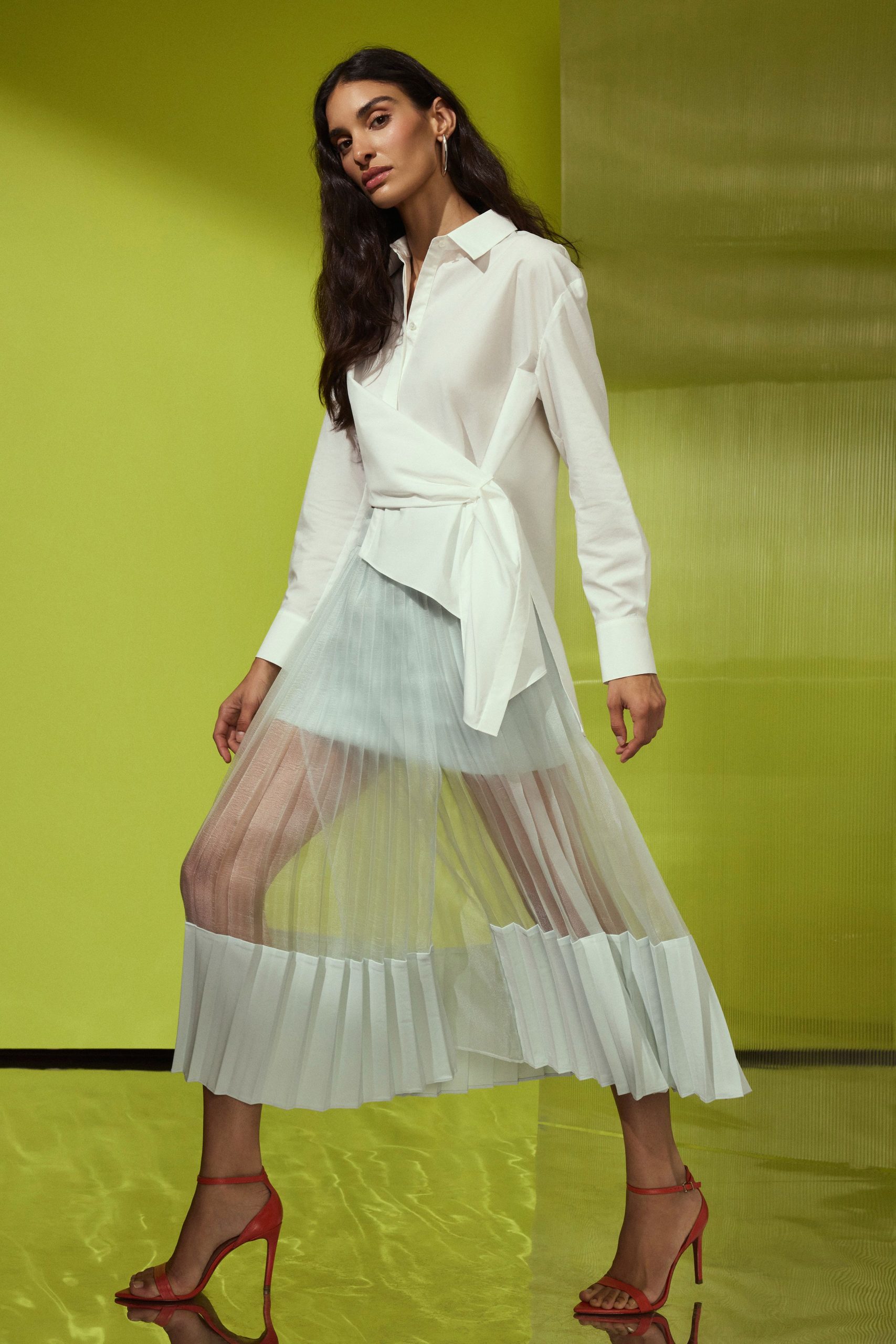 white shirt light blue pleated skirt