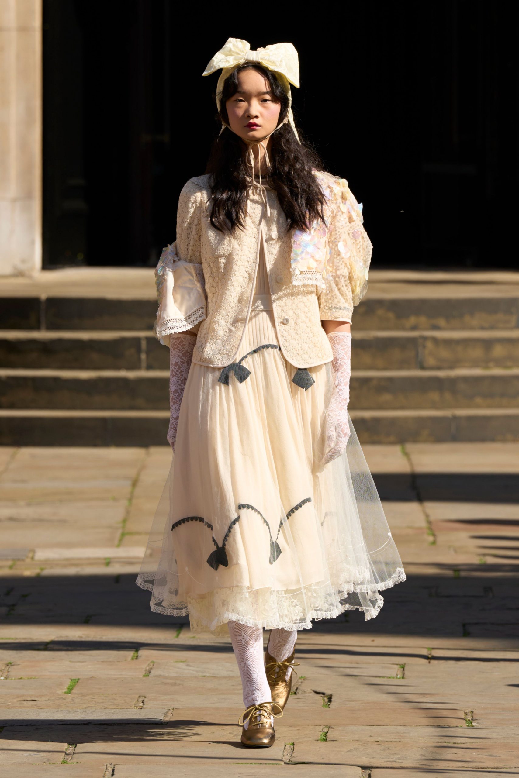 beige cotton long-sleeve collared fitted buttoned ruffled jacket