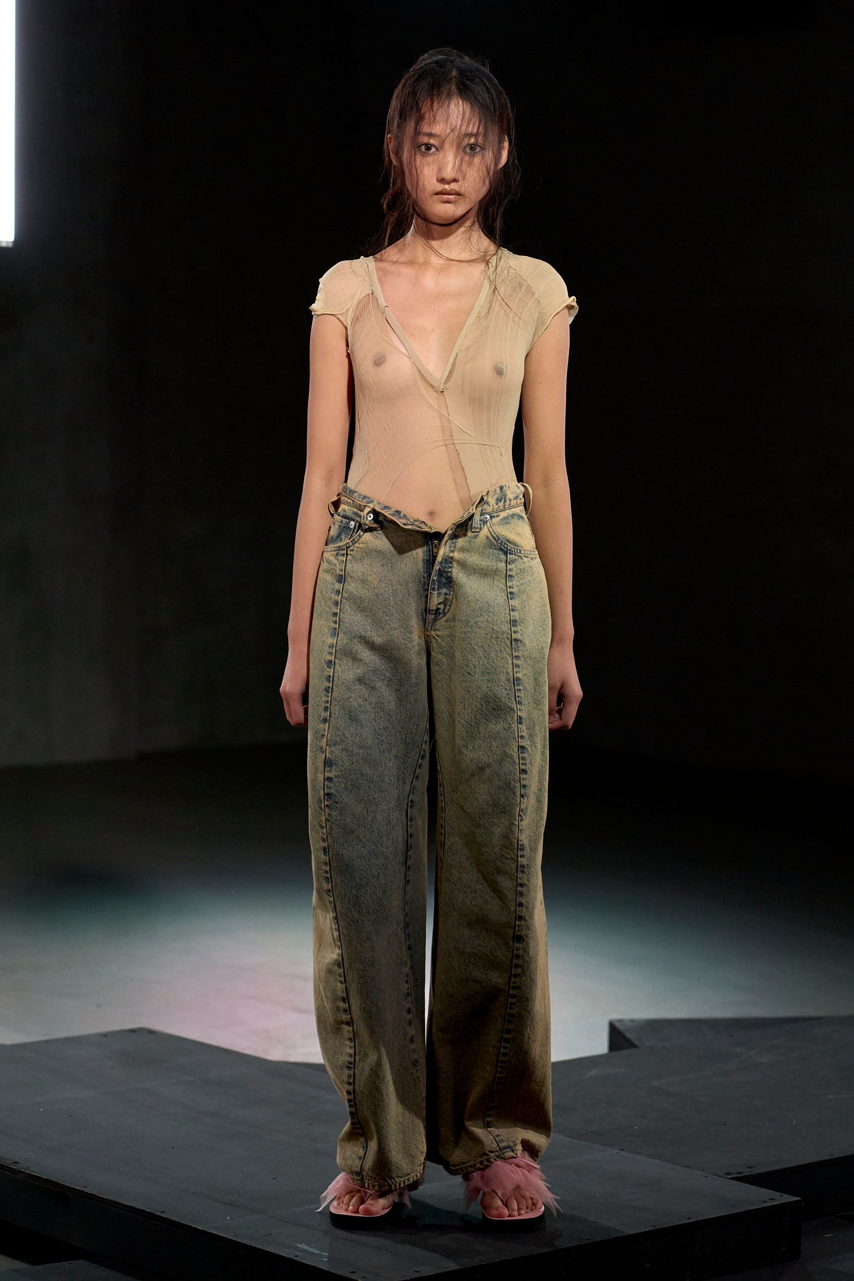 beige mesh top with relaxed denim pants
