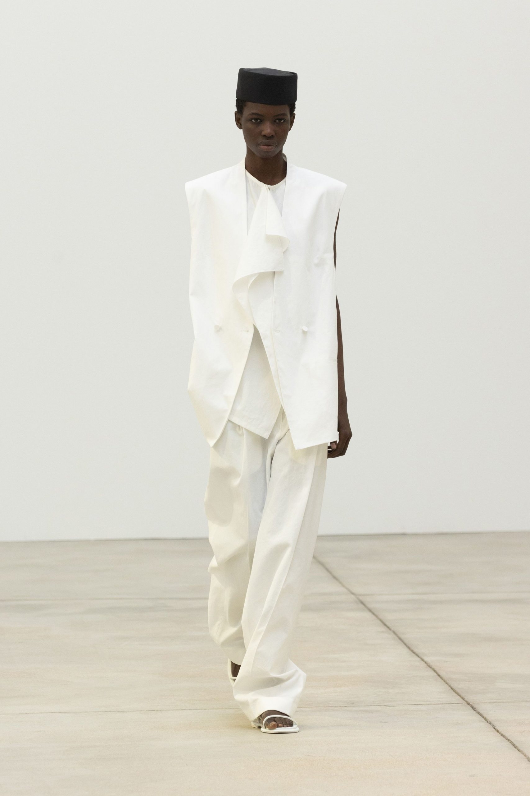 white oversized vest with pants