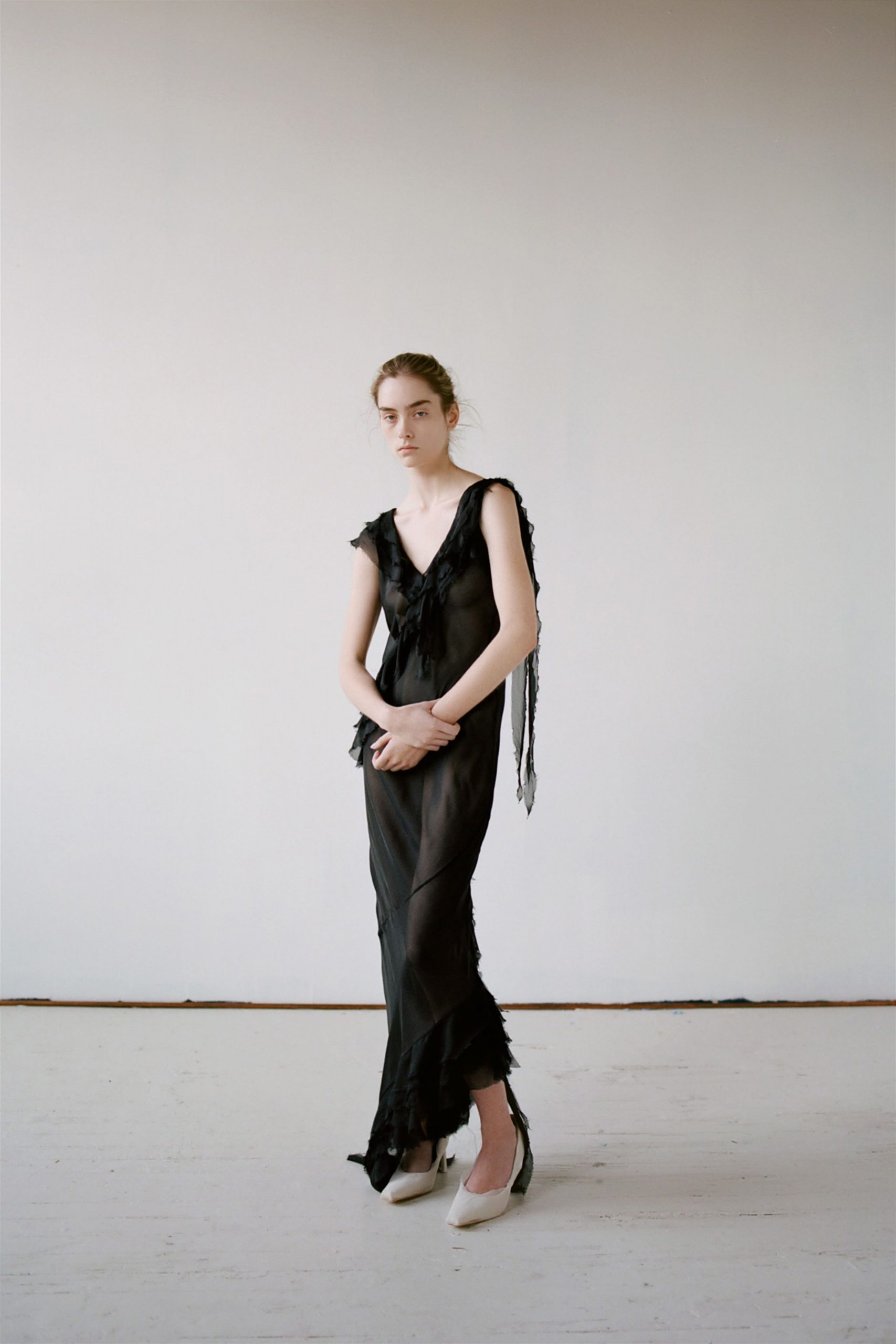 black silk sleeveless gown