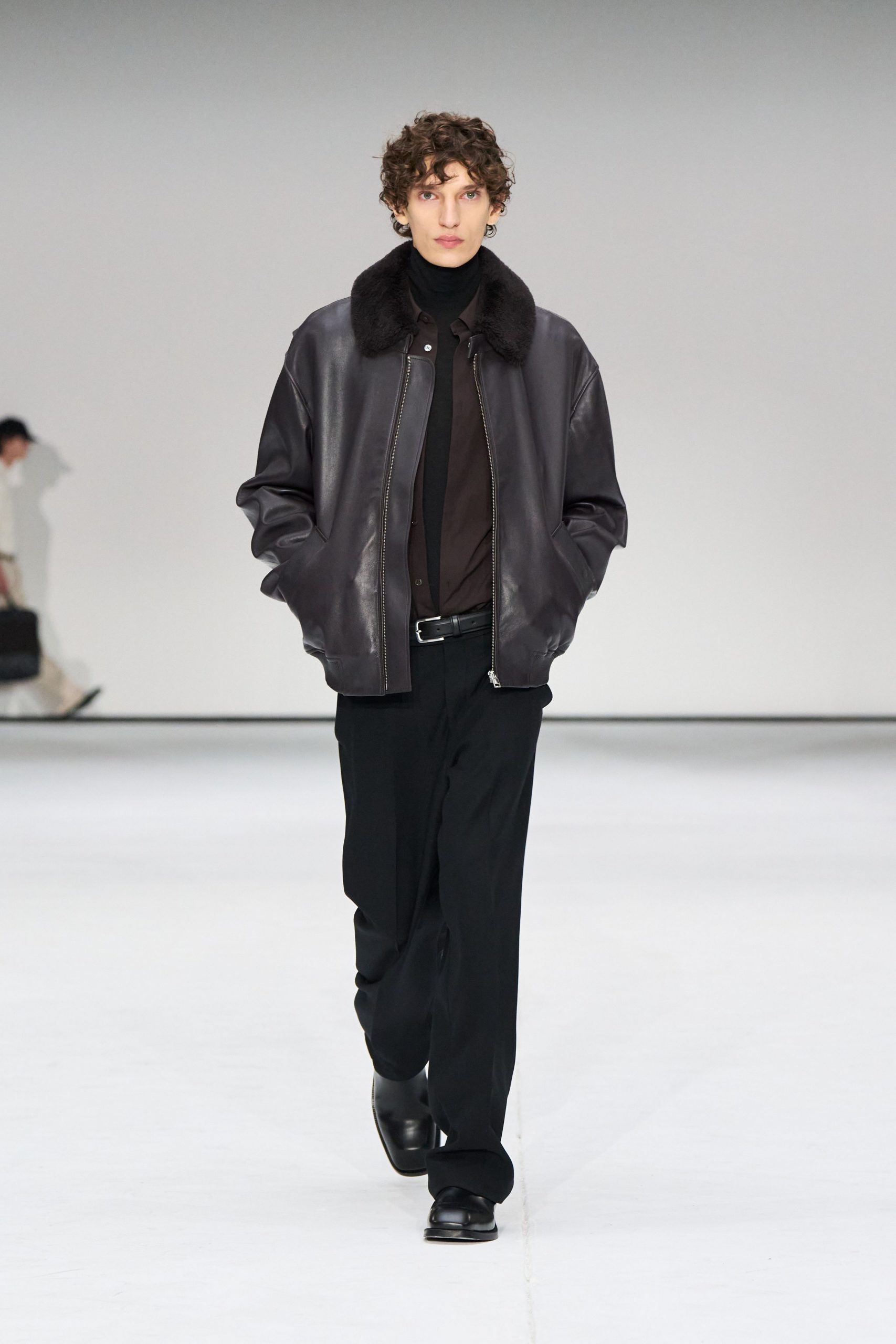 black leather jacket with brown shirt