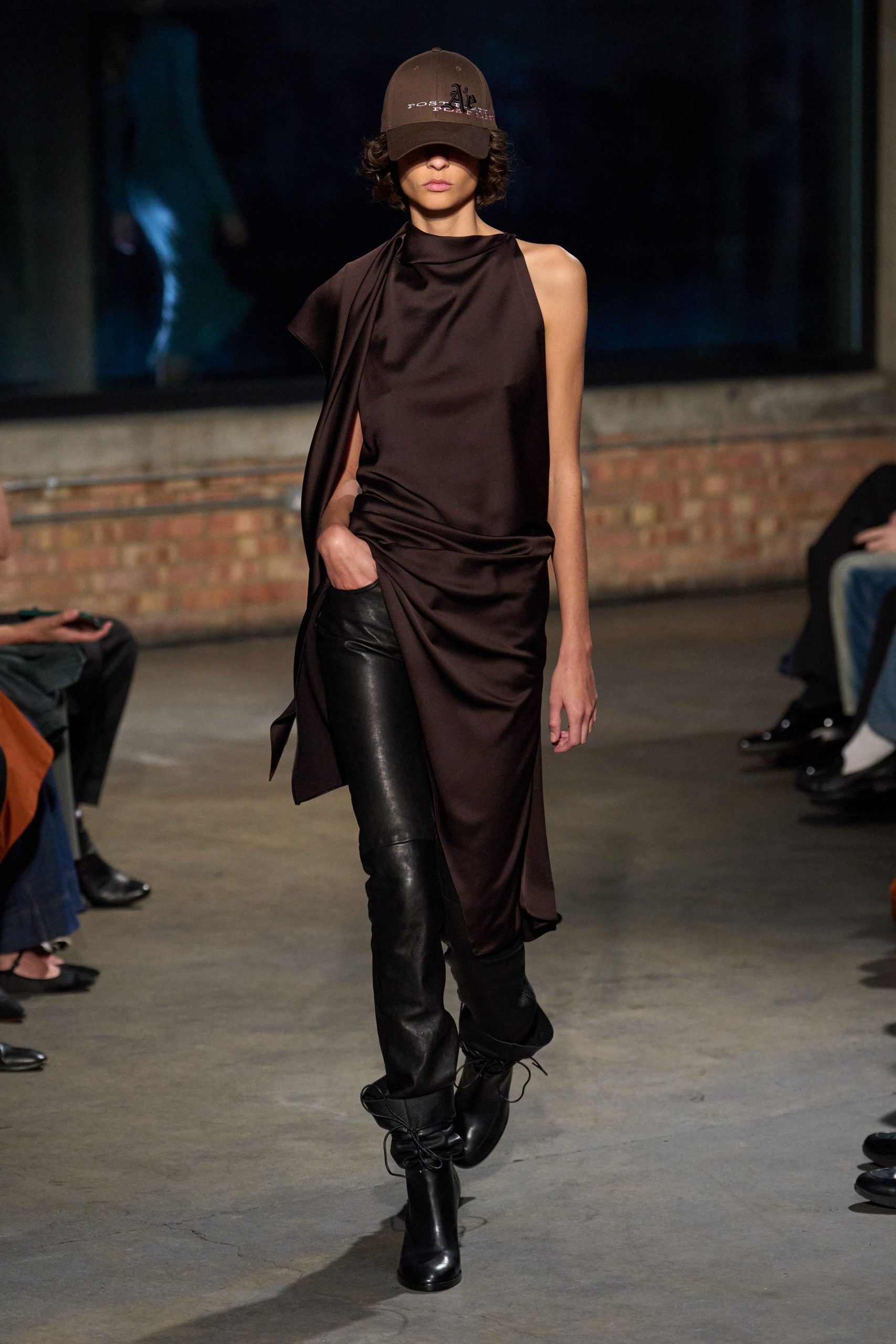 brown silk sleeveless dress with black leather pants