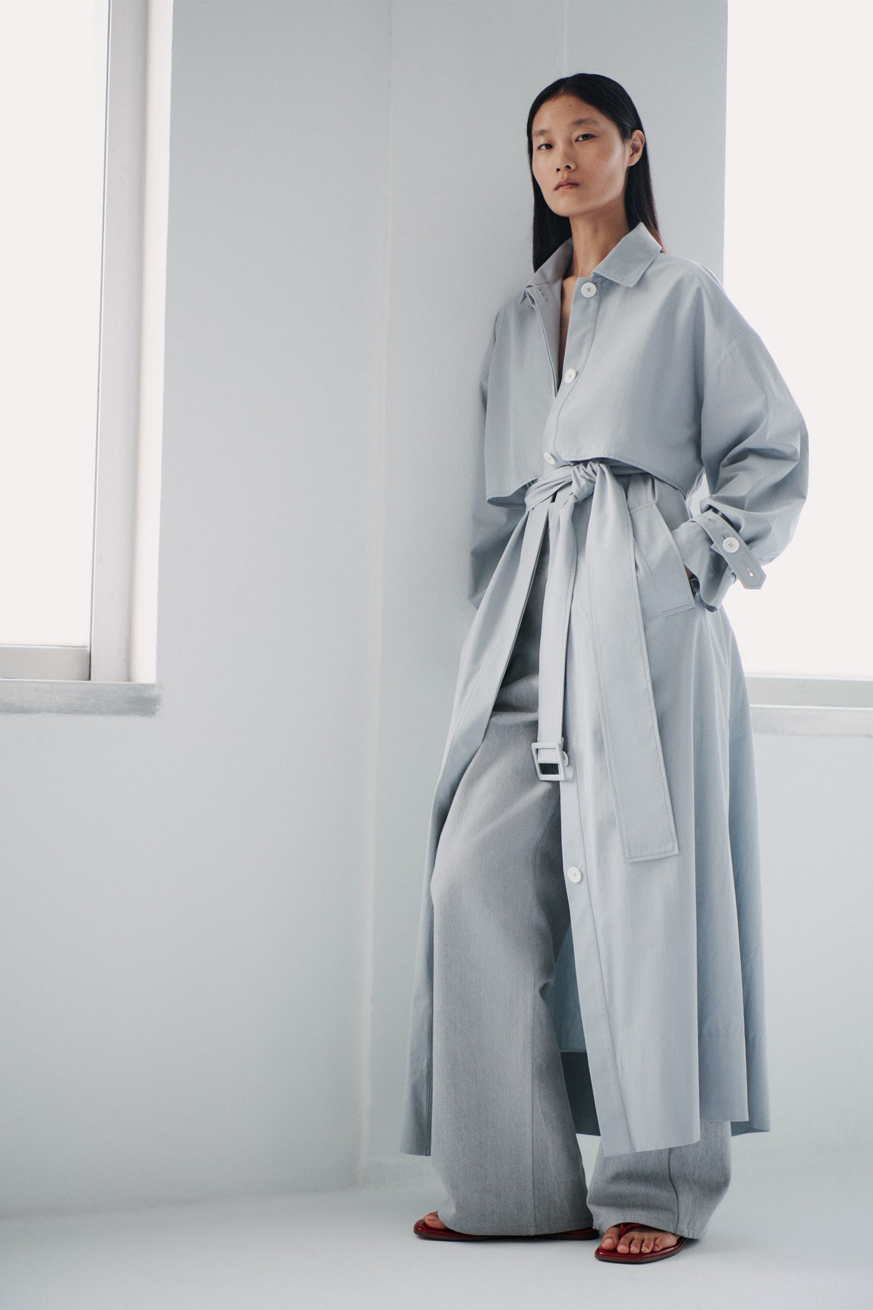 blue cotton long-sleeve collared relaxed belted maxi trench