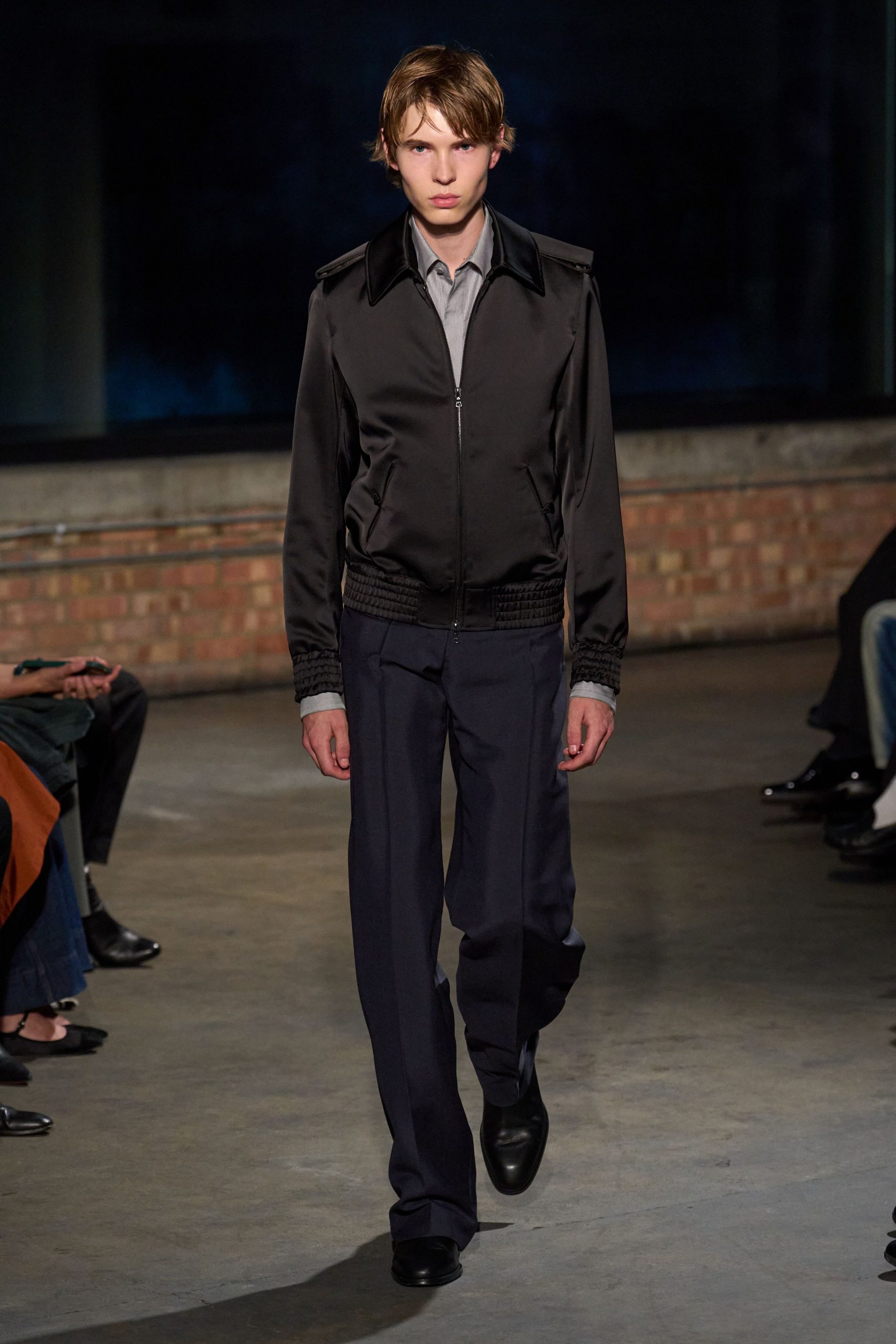 black silk jacket gray shirt navy pants