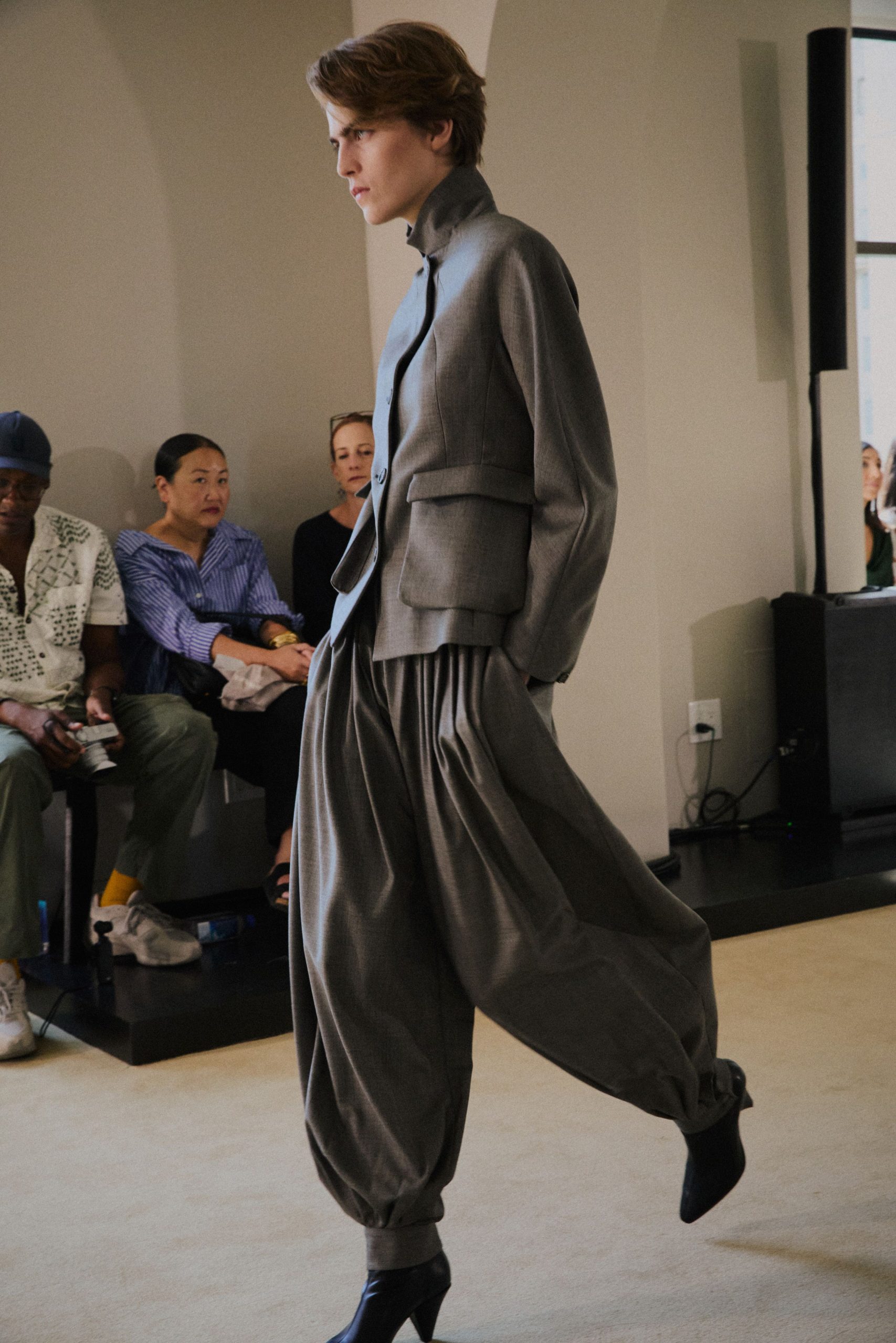 gray structured jacket and relaxed pants