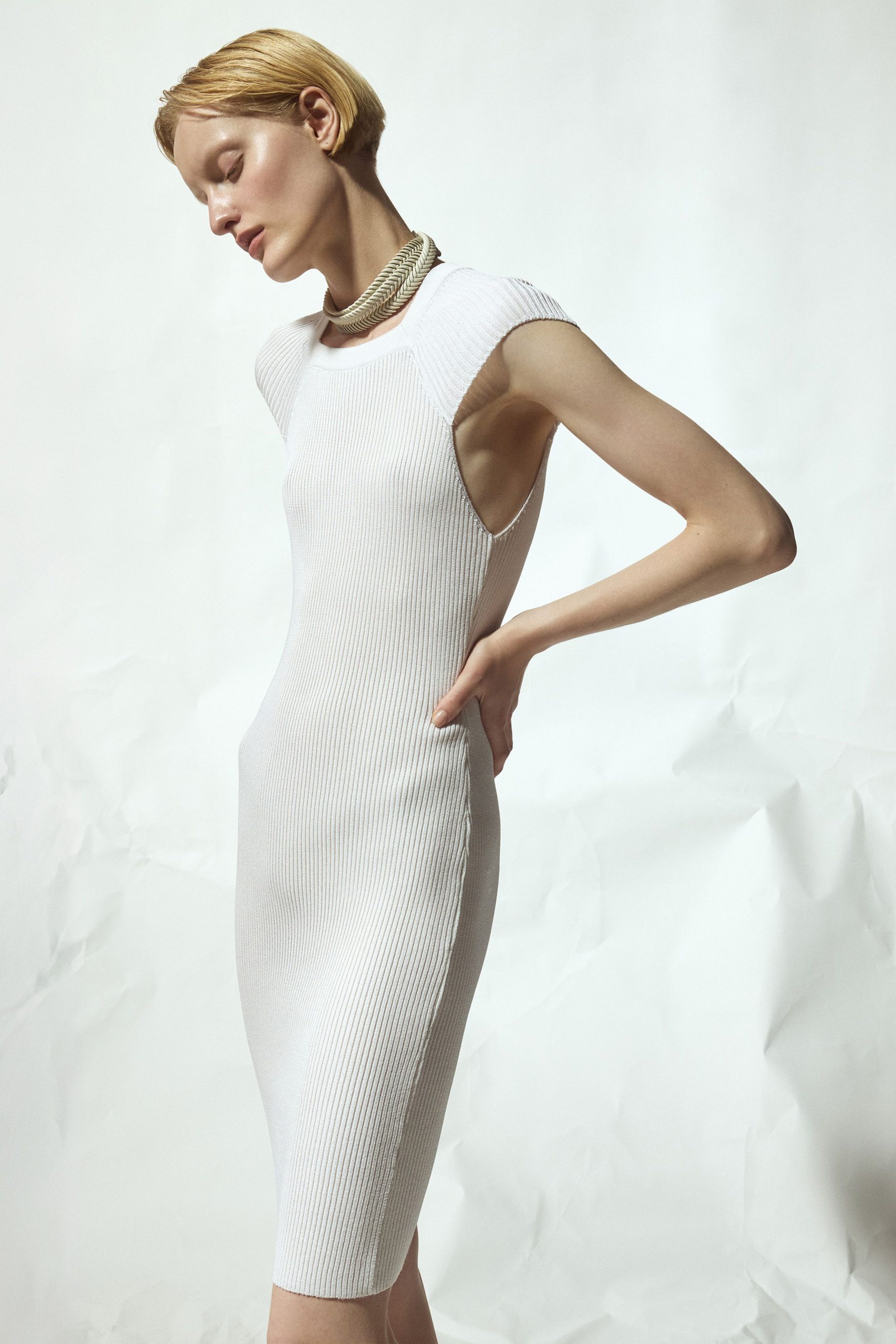 fitted white ribbed dress