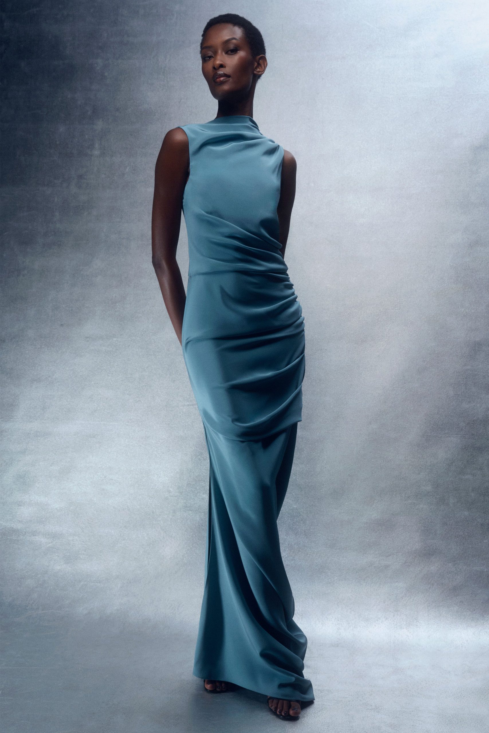 blue silk sleeveless gown
