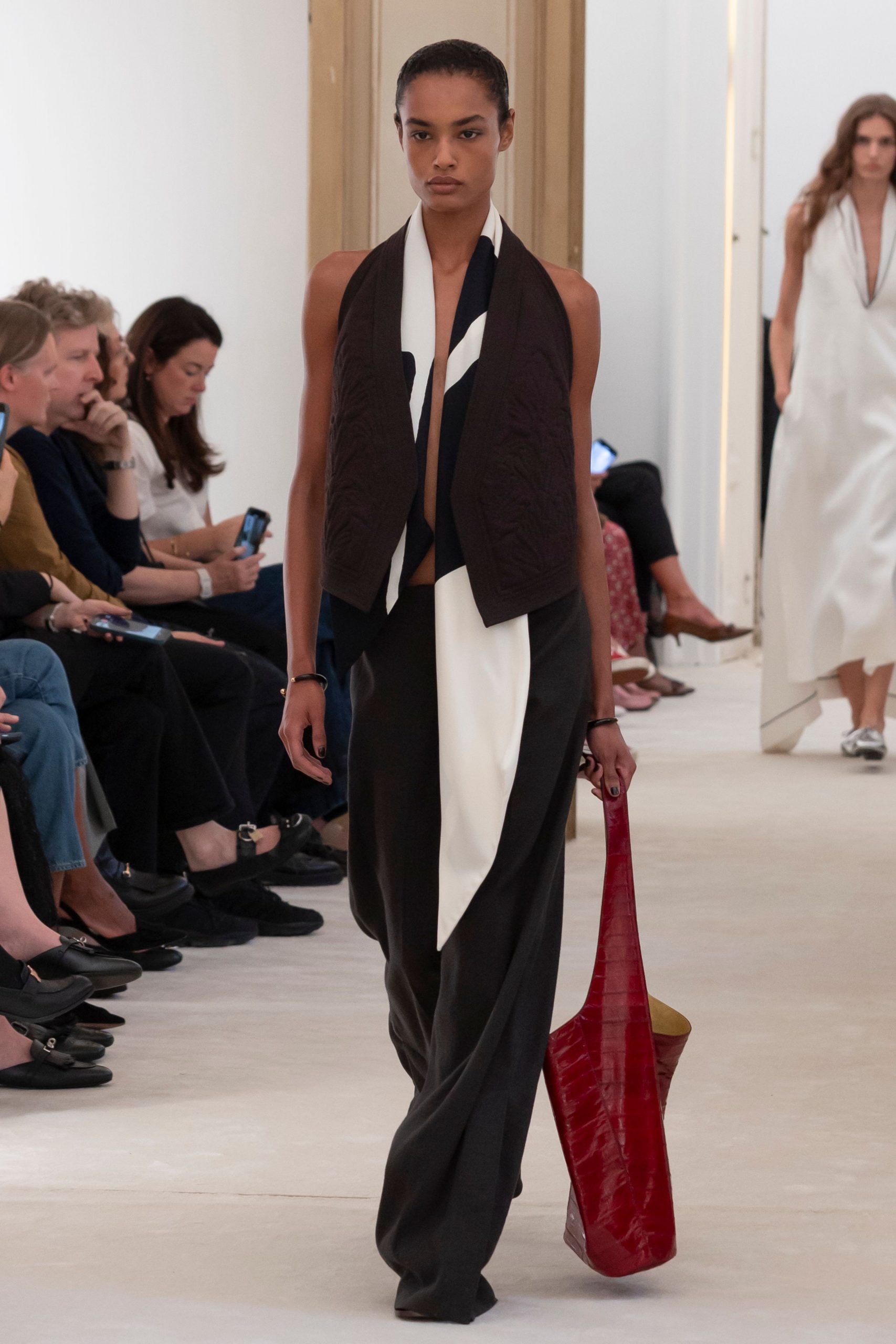 black and white layered top with wide-leg pants