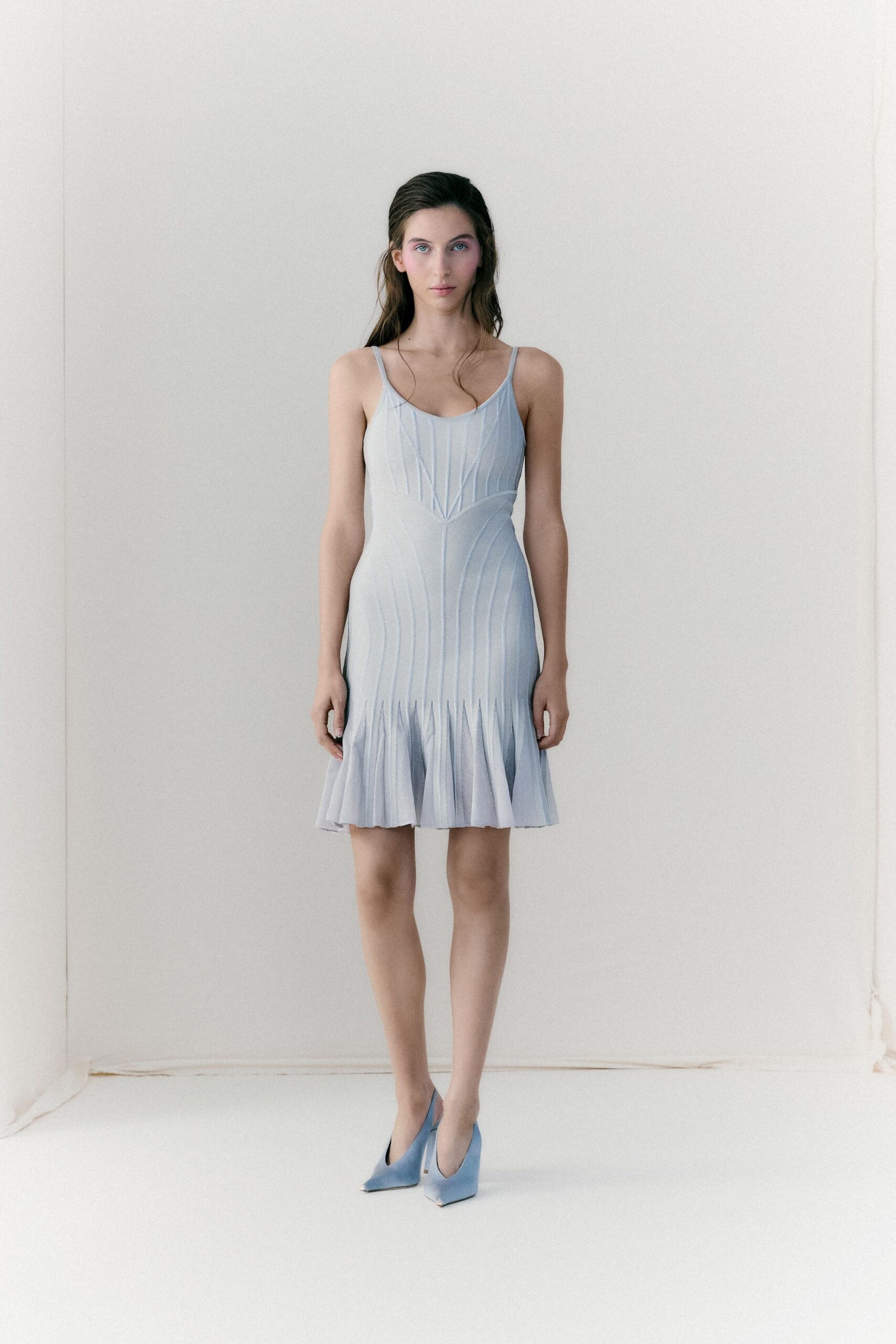 blue cotton sleeveless v-neck fitted pleated flared dress