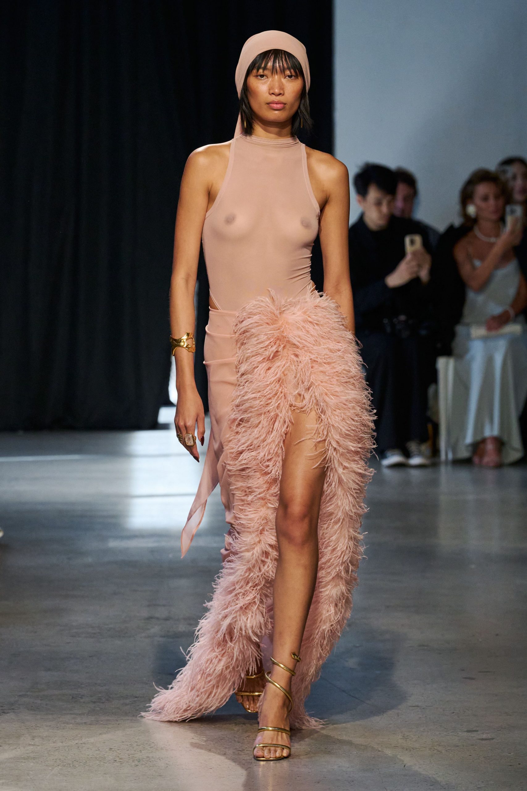 pink silk sleeveless high-neck fitted ruffled flowing gown