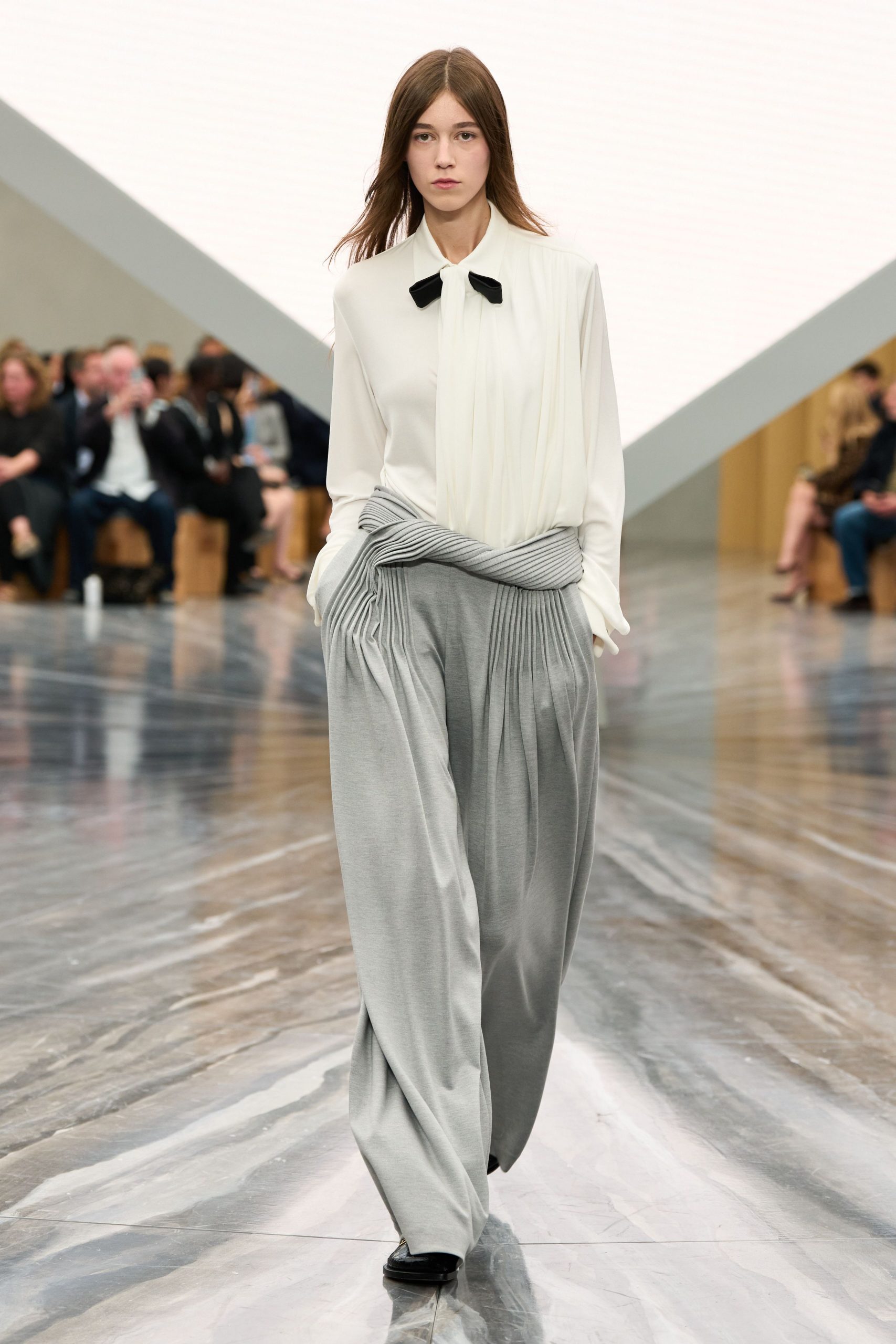 white relaxed shirt gray wide-leg pants