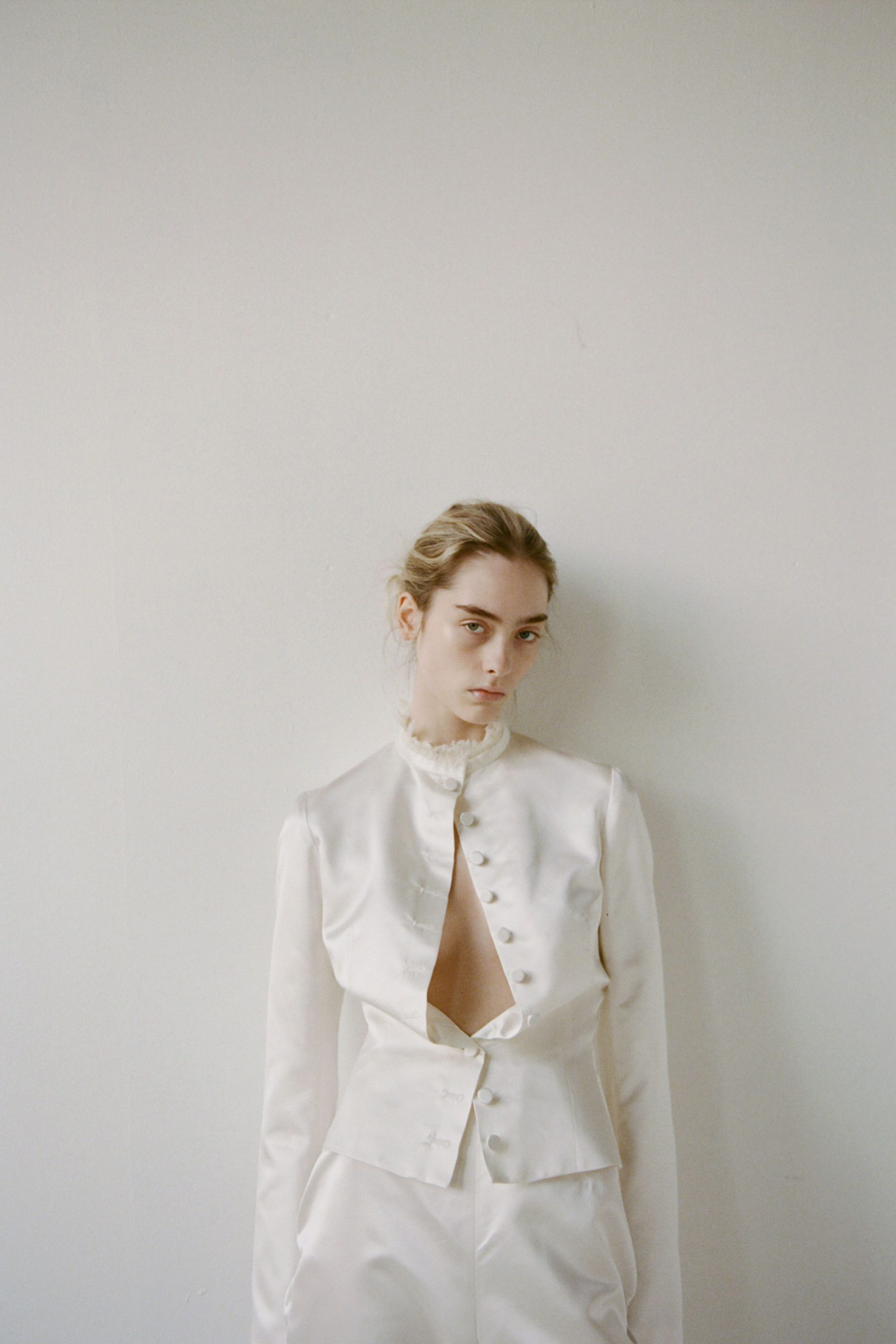 white silk long-sleeve collared fitted buttoned blazer